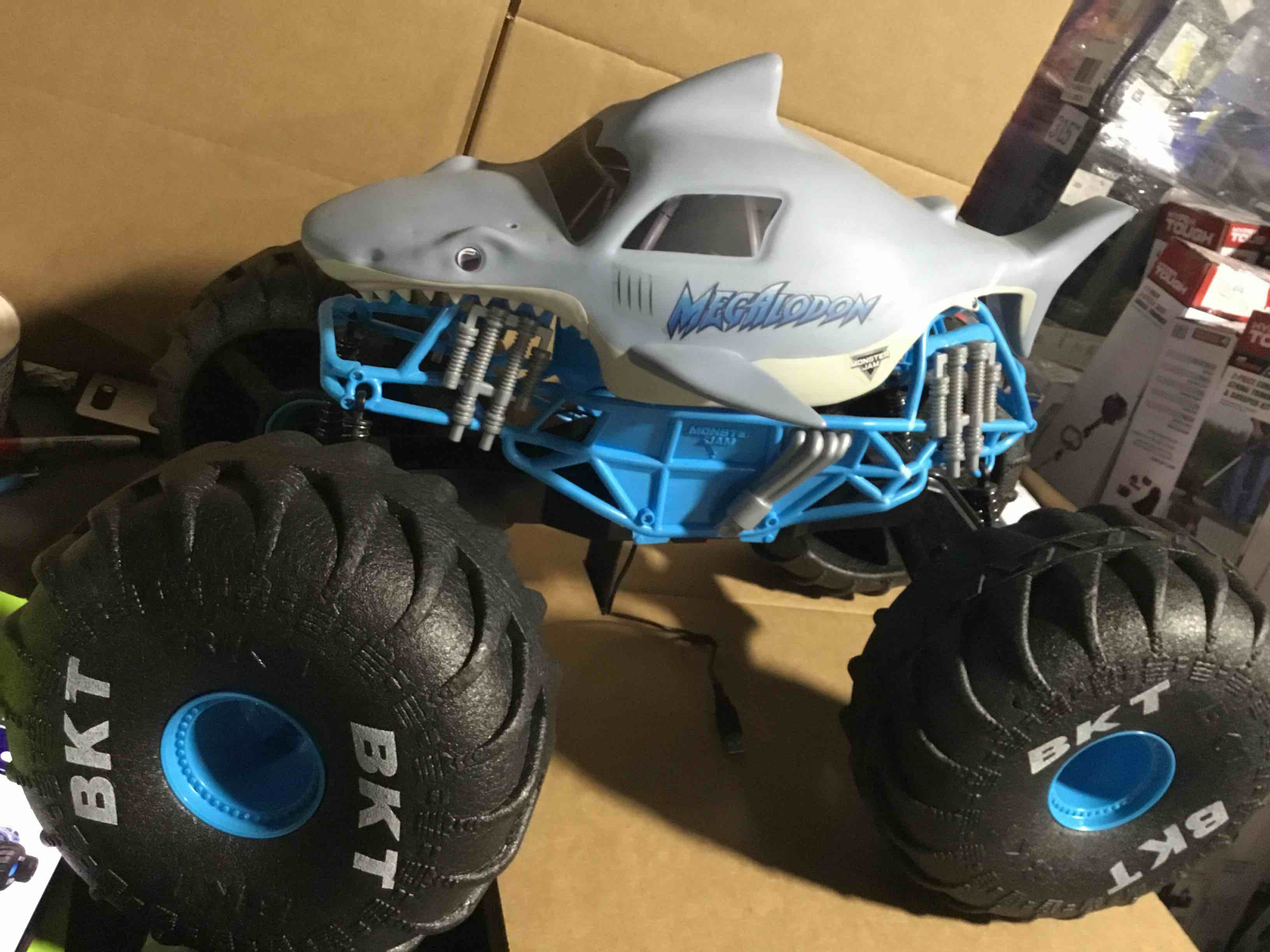 Condition photo showing As Is for Monster Jam, Official Megalodon Remote Control Monster Truck, 1:24 Scale, 2.4 GHz, for Ages 4 and Up