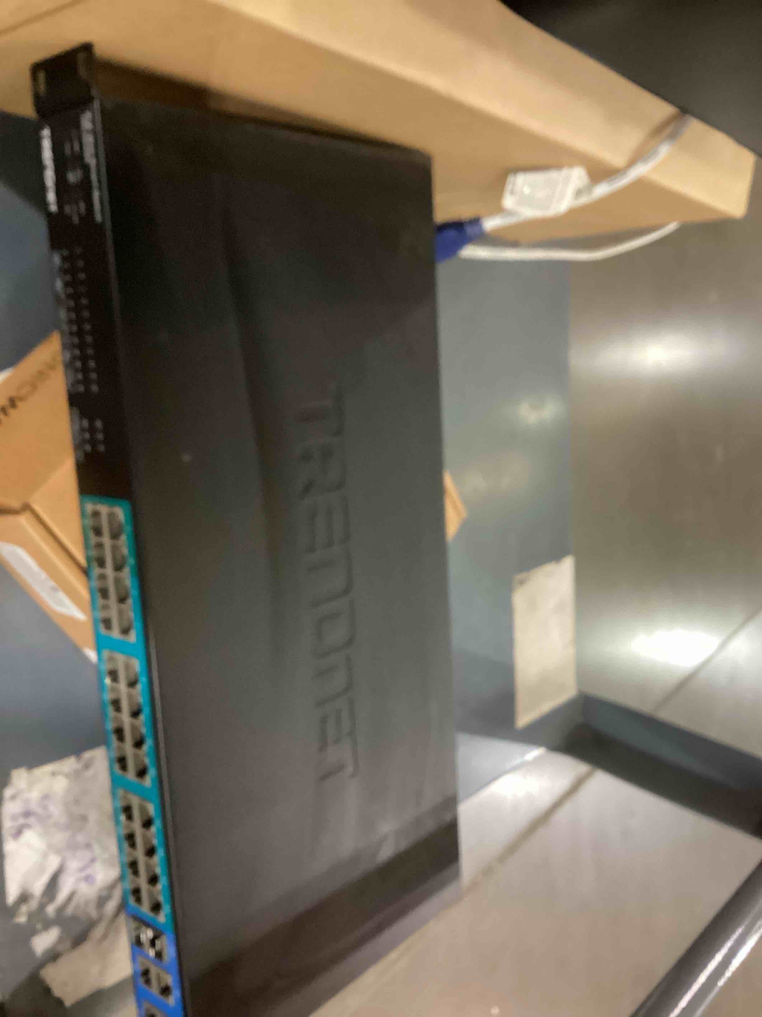 Condition photo showing Good Condition for overview +4 based on the image provided, the device appears to be a trendnet 28-port web smart po