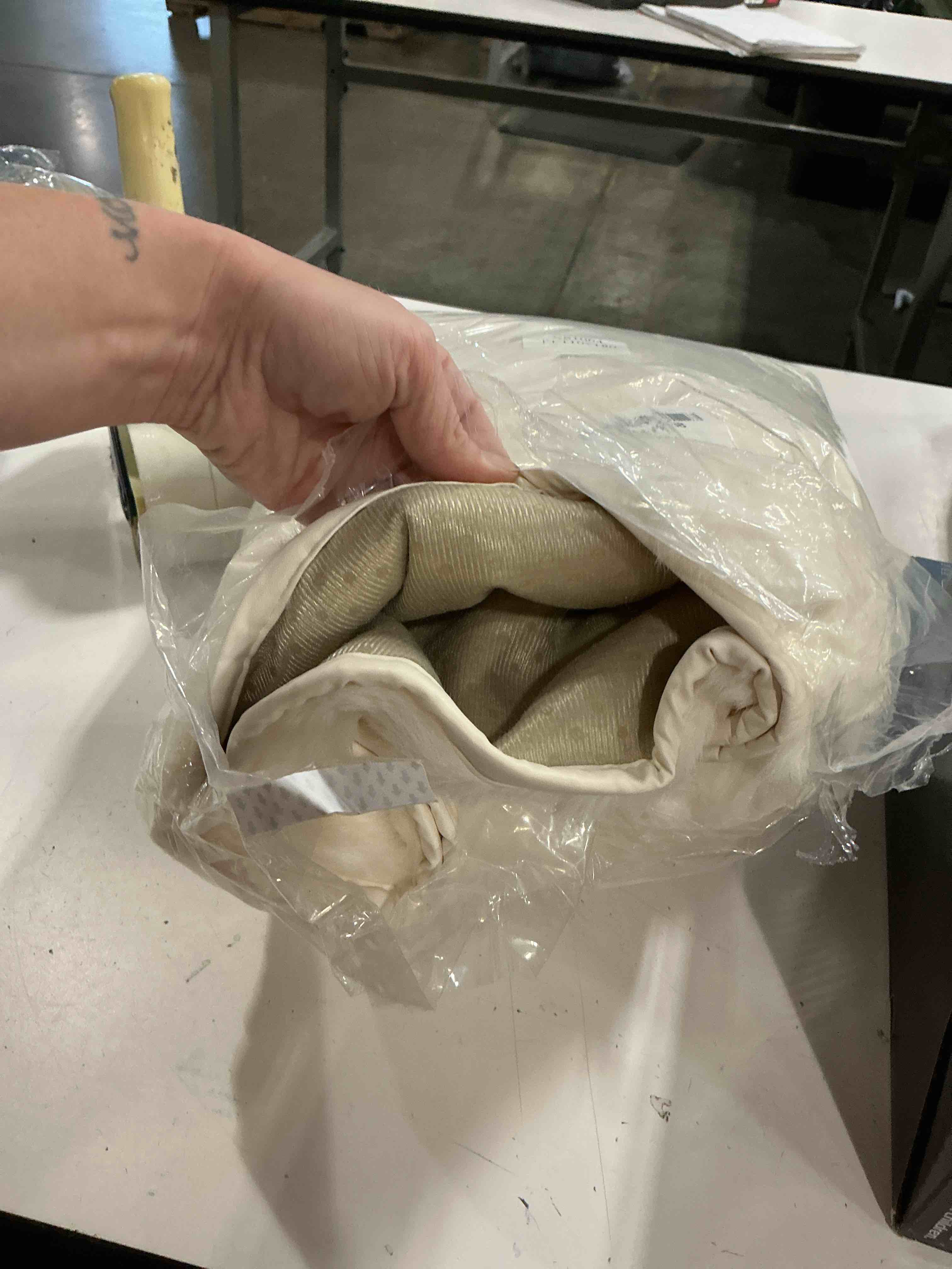 Condition photo showing As Is for 110x180 white fuzzy area rug