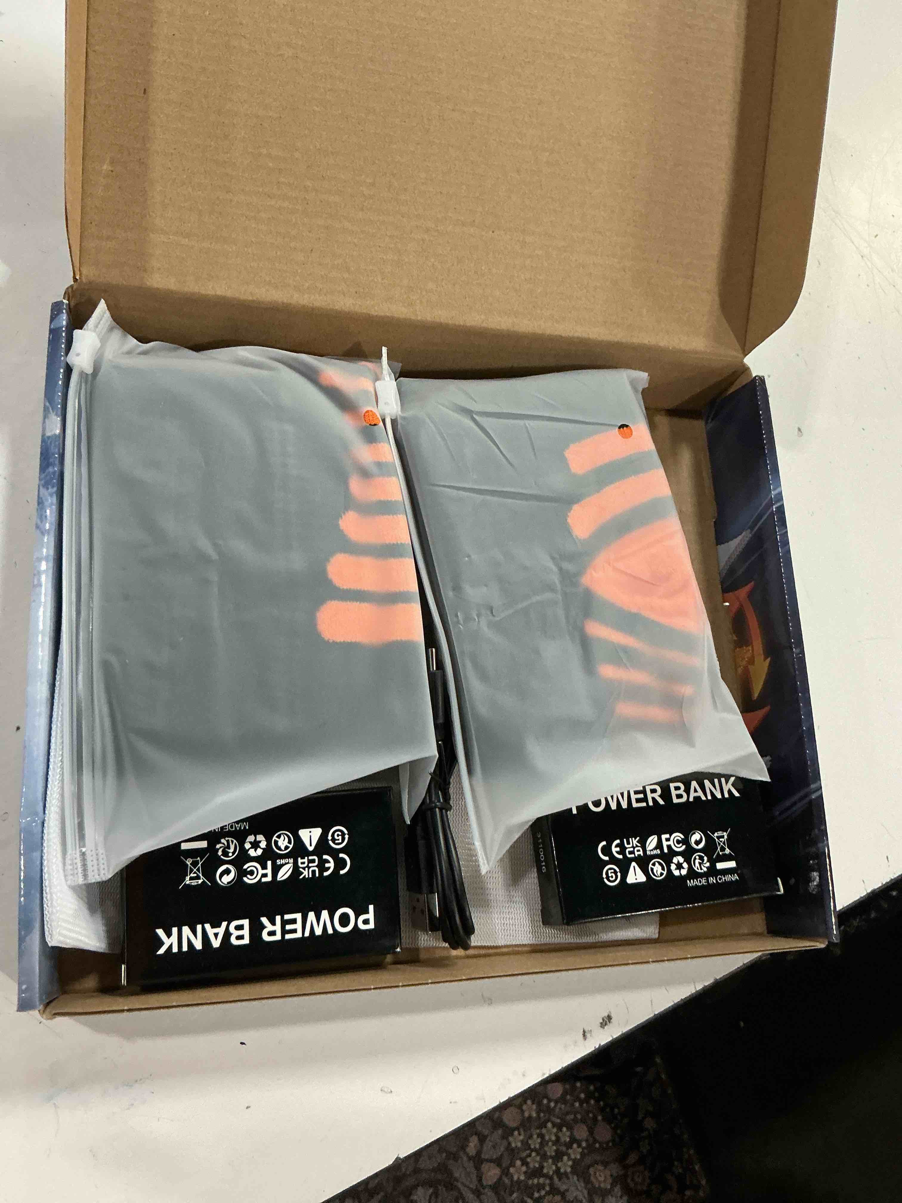 Condition photo showing New/Like New for heated socks