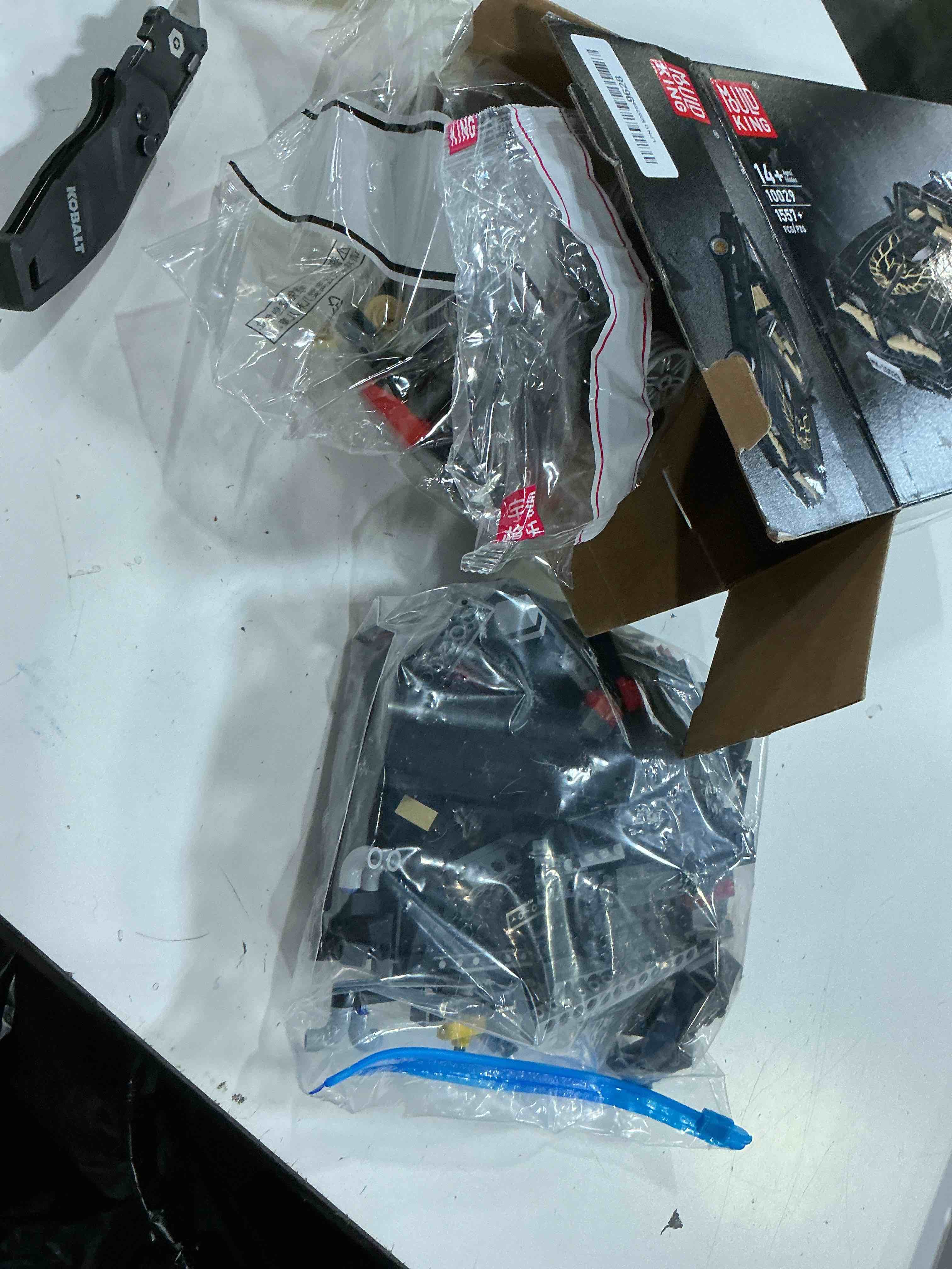 Condition photo showing As Is for mould king 10029 technical sports car building sets,1557+ pcs firebird muscle car model, creative construction toy for teens and adults 14+