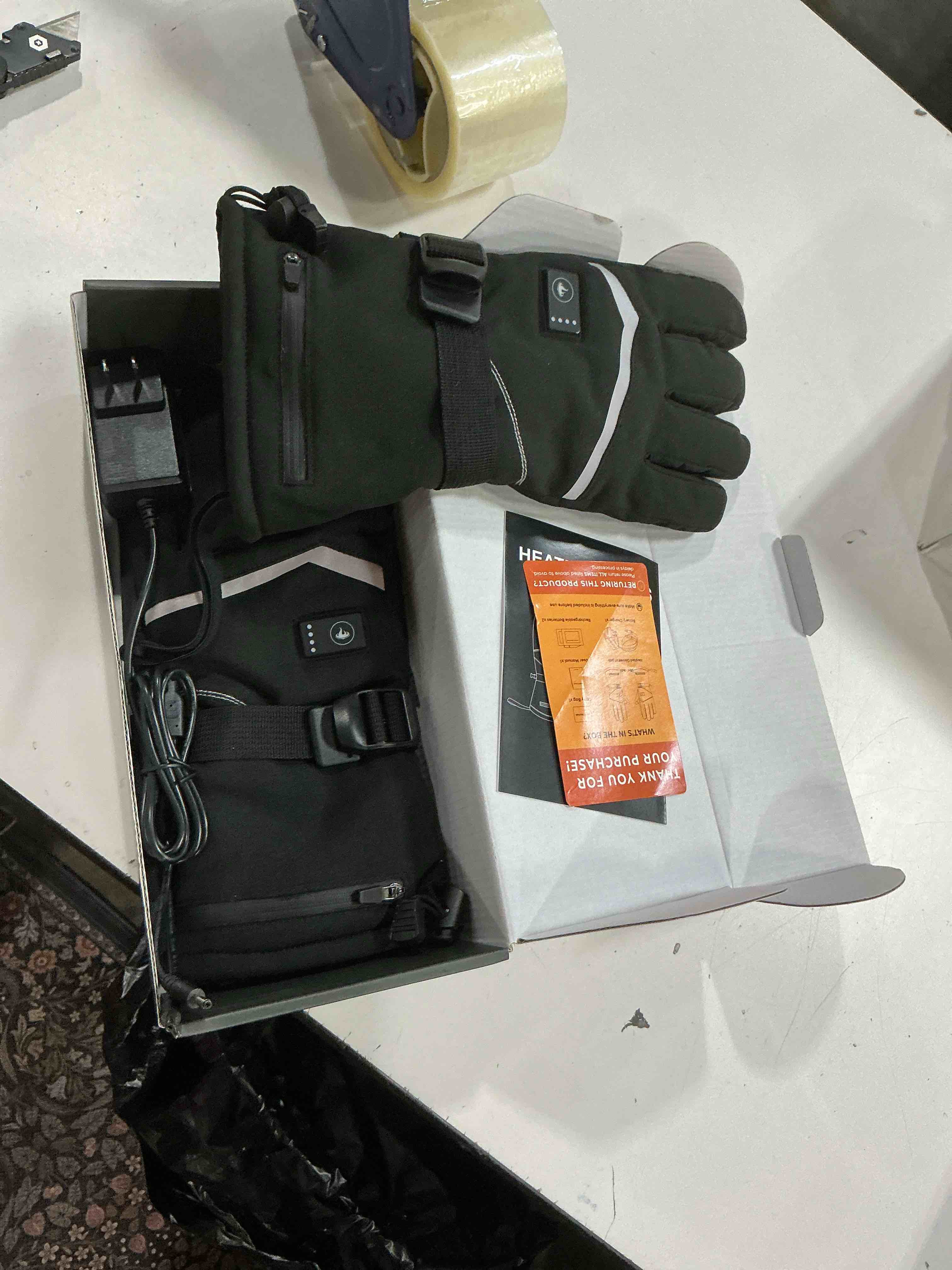 Condition photo showing New/Like New for heated gloves 