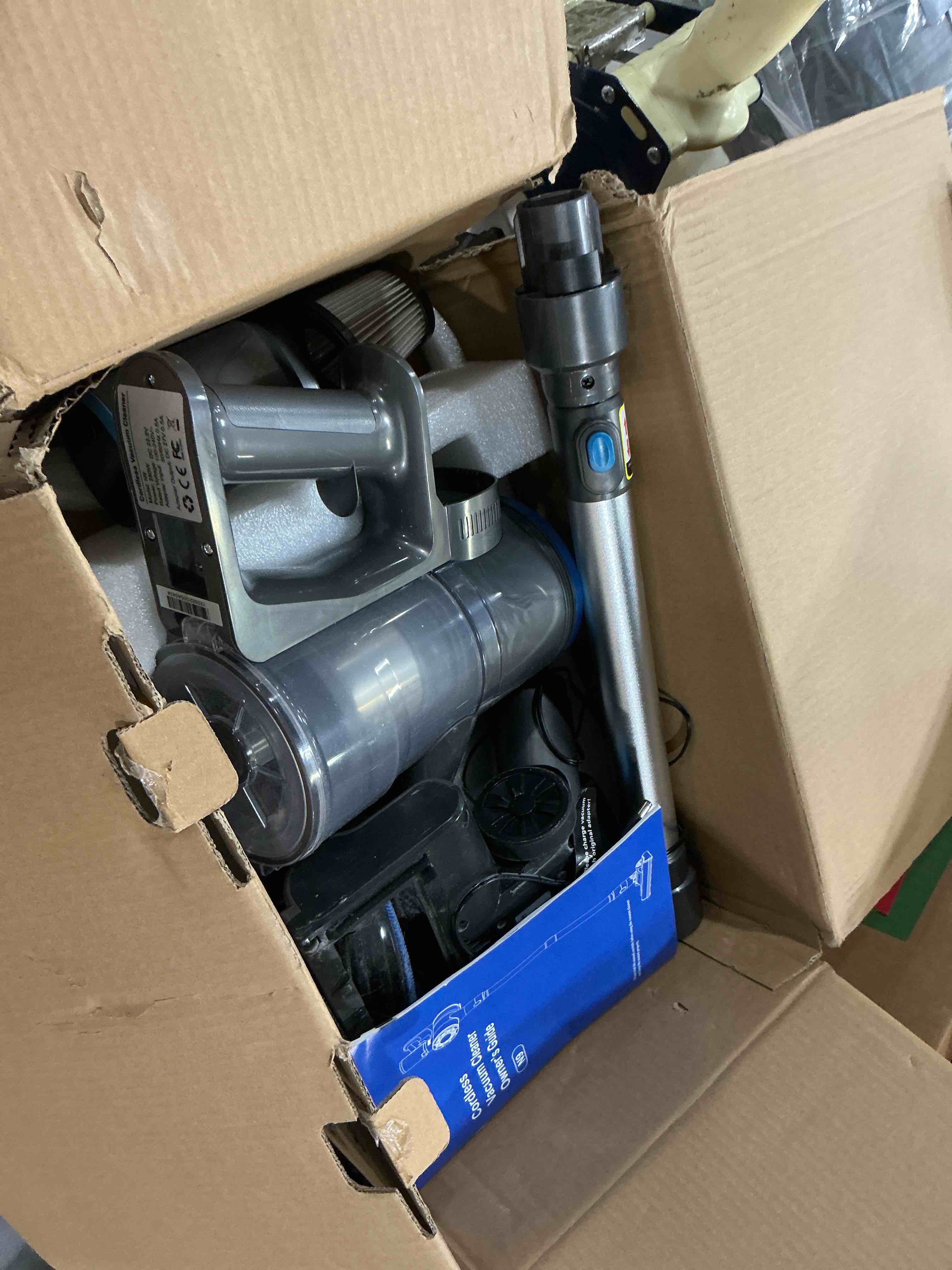 Condition photo showing As Is for cordless vacuum 