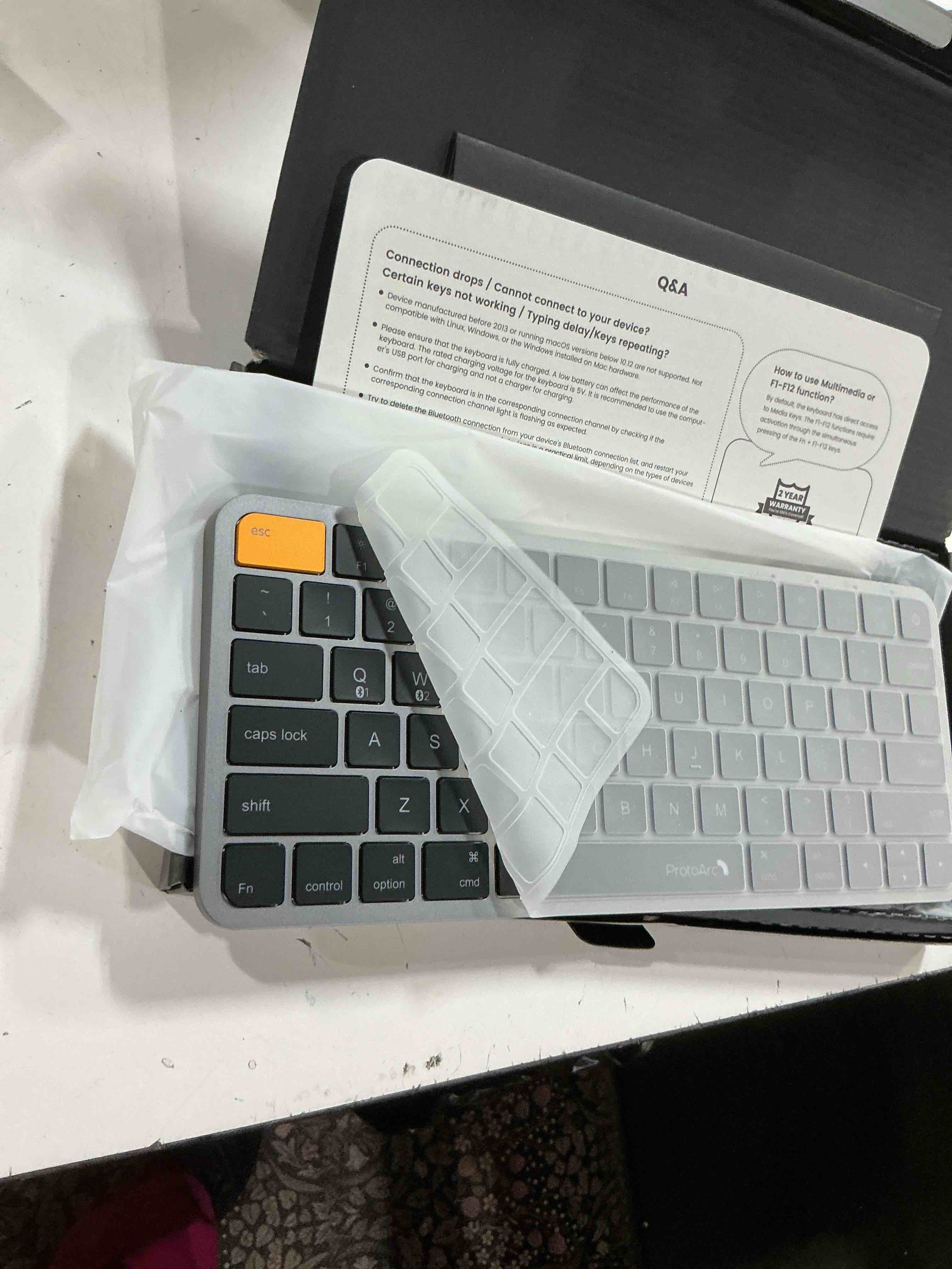 Condition photo showing New/Like New for protoarc bluetooth keyboard for ipad, k90-a backlit compact wireless keyboard for mac, multi-device, low profile, rechargeable, compatible with macbook pro/air/neo, imac, not for windows - space gray