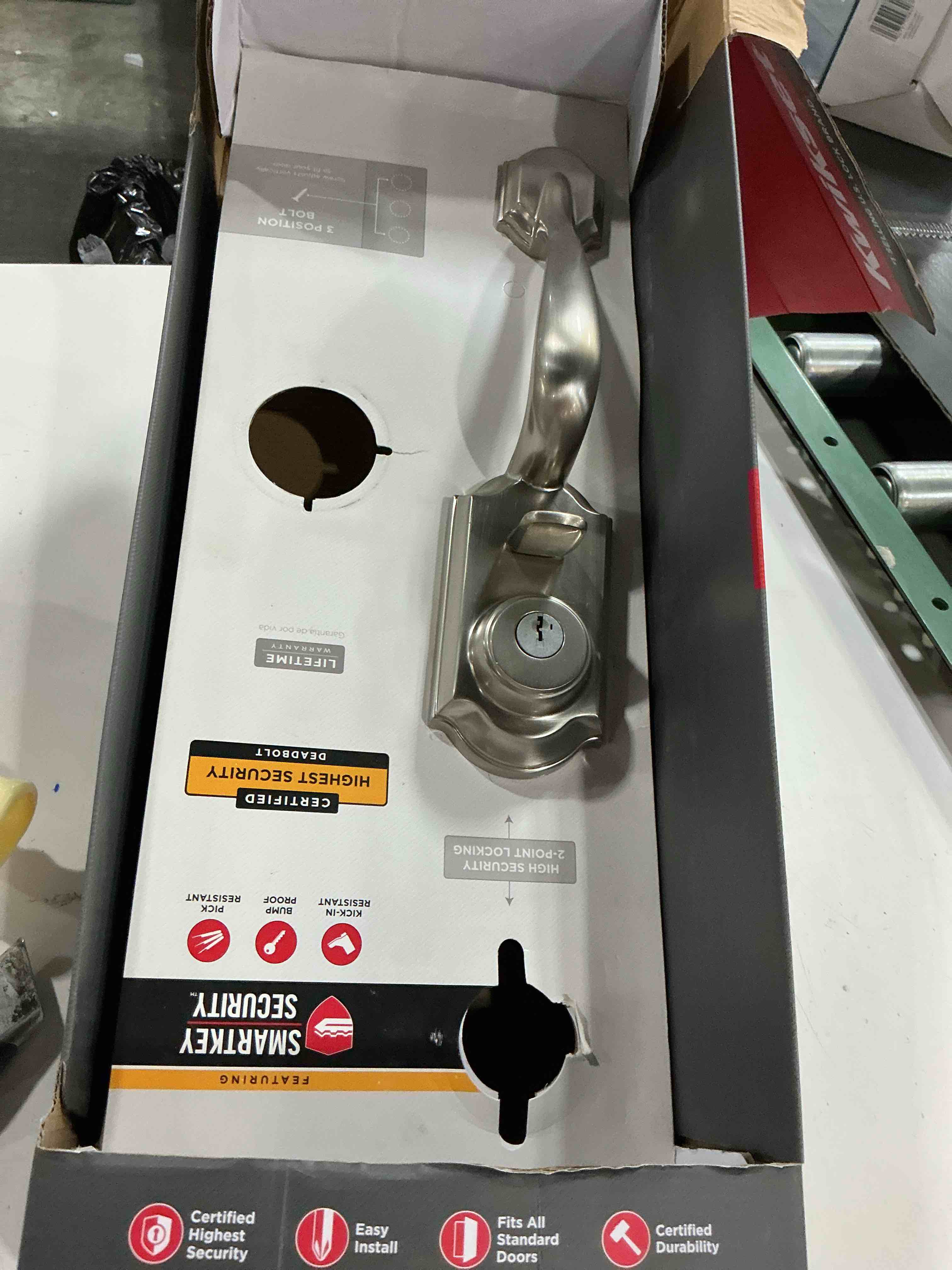 Condition photo showing As Is for kwikset montara front door lock handle and deadbolt set, entry handleset exterior with interior doorknob, satin nickel, pick resistant smartkey rekey deadbolt security, with microban protection