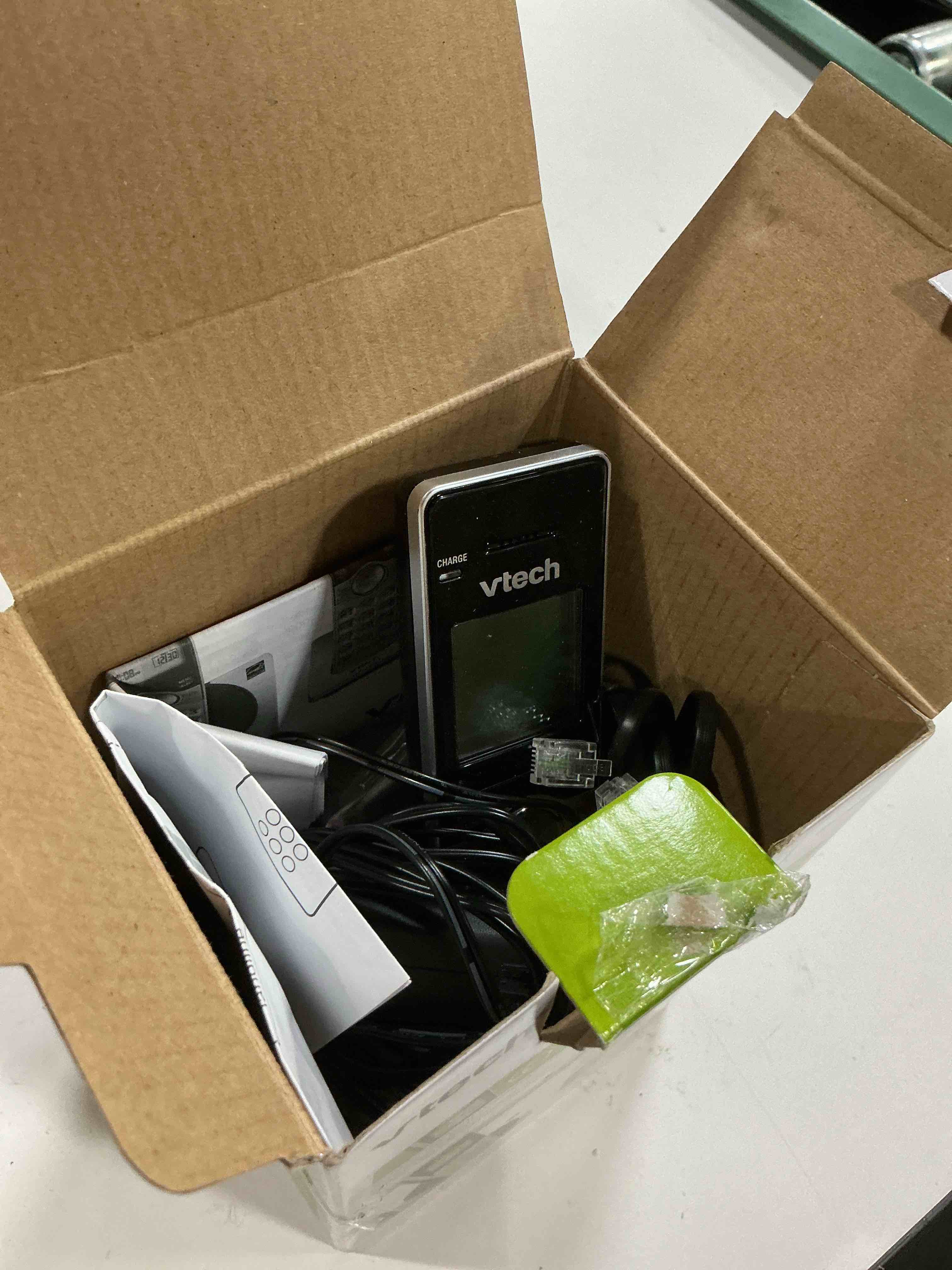 Condition photo showing As Is for vtech dect 6.0 expandable cordless phone with call block  cs6919 (silver & black)