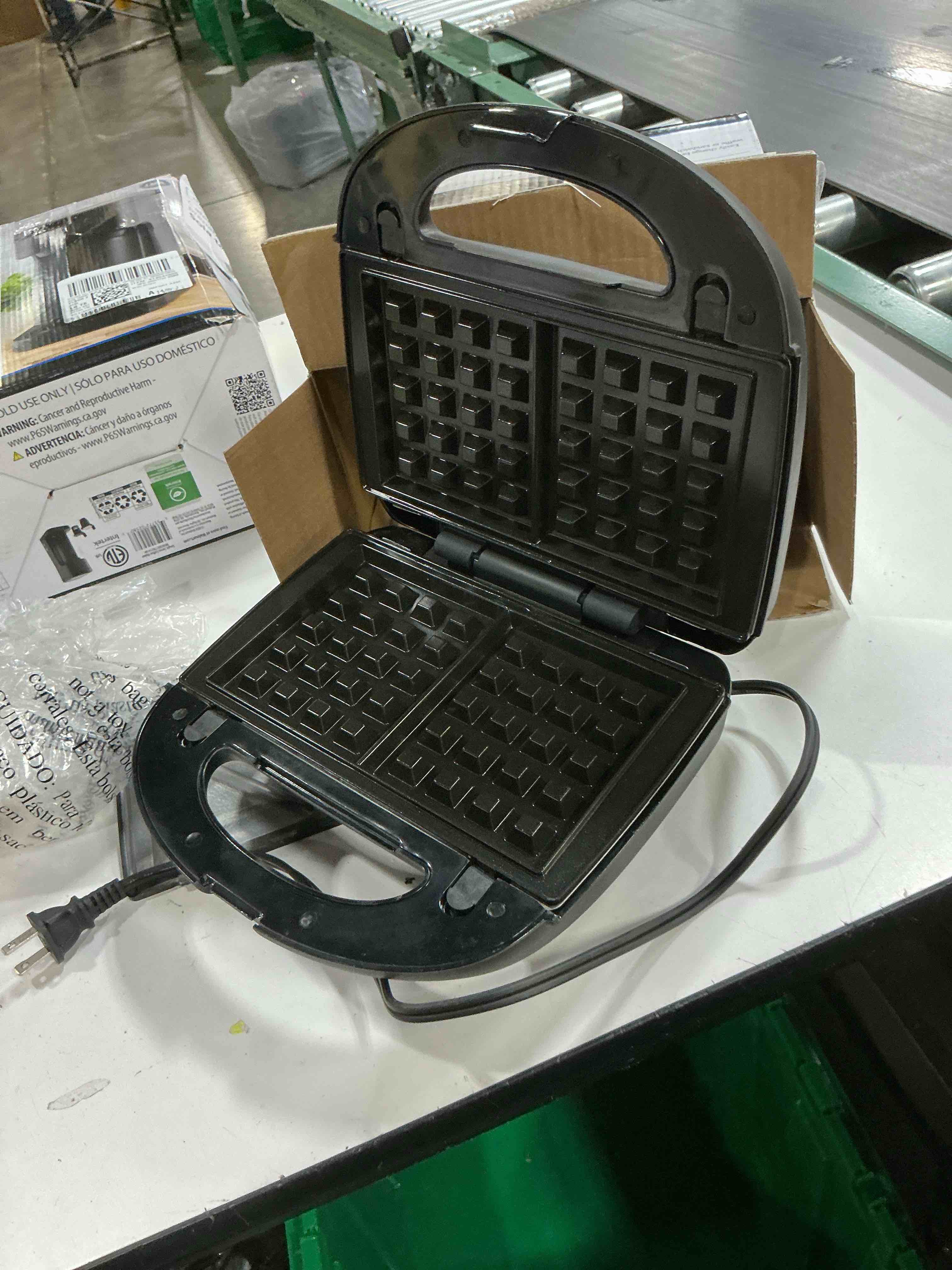 Condition photo showing As Is for mainstays black 2 in 1 waffle and sandwich maker, nonstick, removable plates