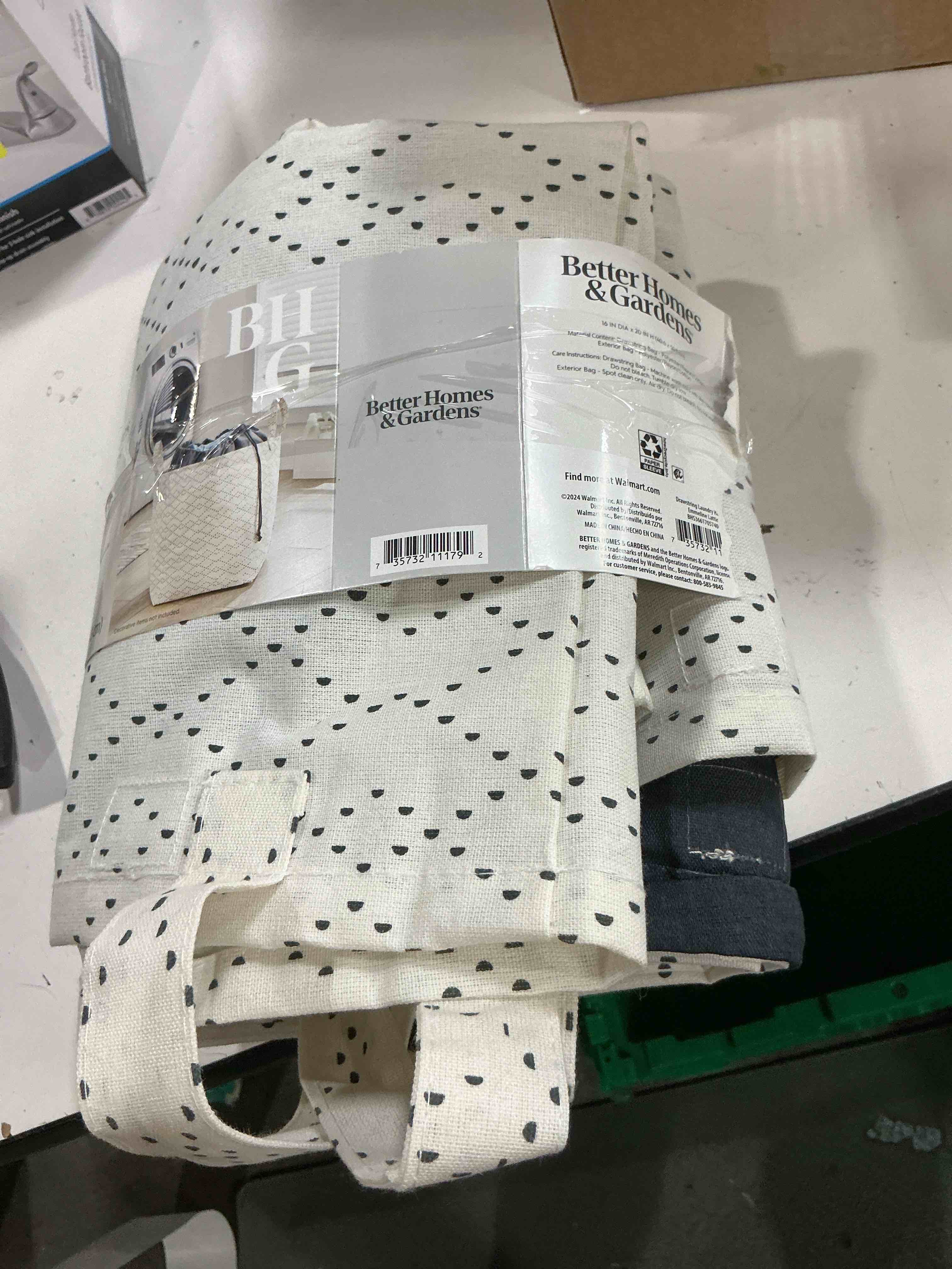 Condition photo showing As Is for better homes & gardens white/black lattice drawstring laundry tote  16  x 20