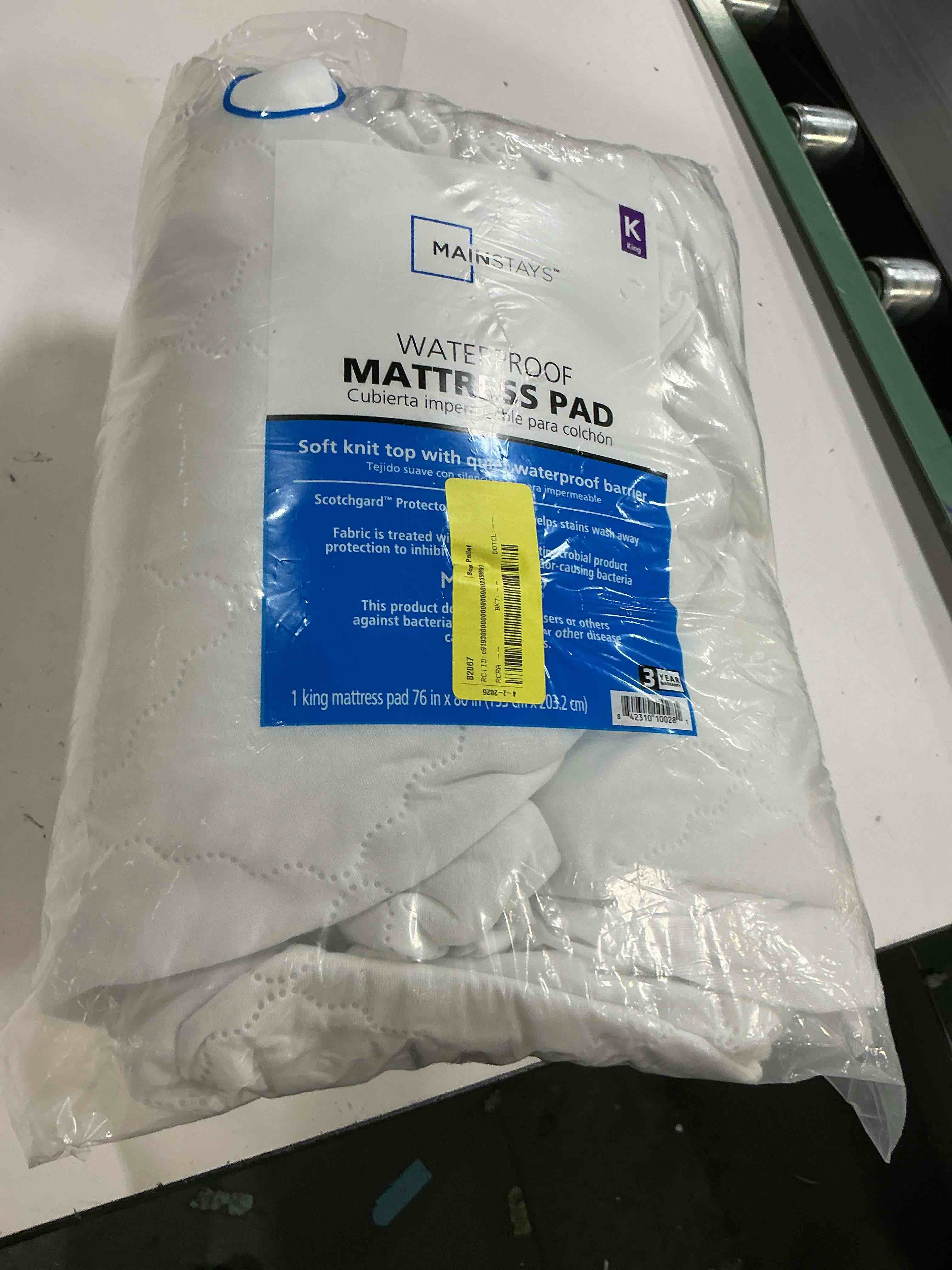 Condition photo showing As Is for mainstays mattress pad, king size 