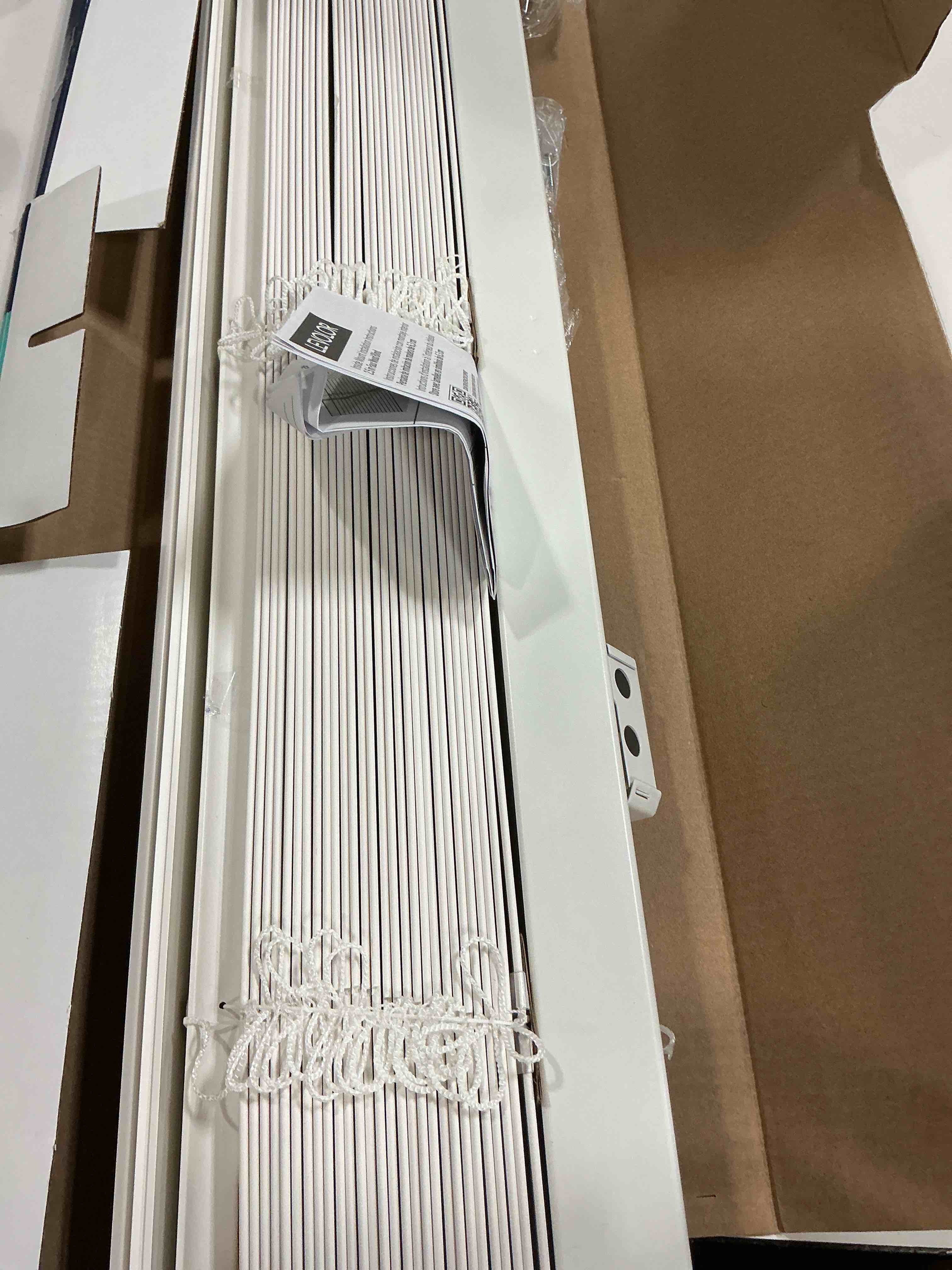 Condition photo showing Good Condition for levolor cordless room darkening white faux wood width 35-in x 64-in 2.5-in slat