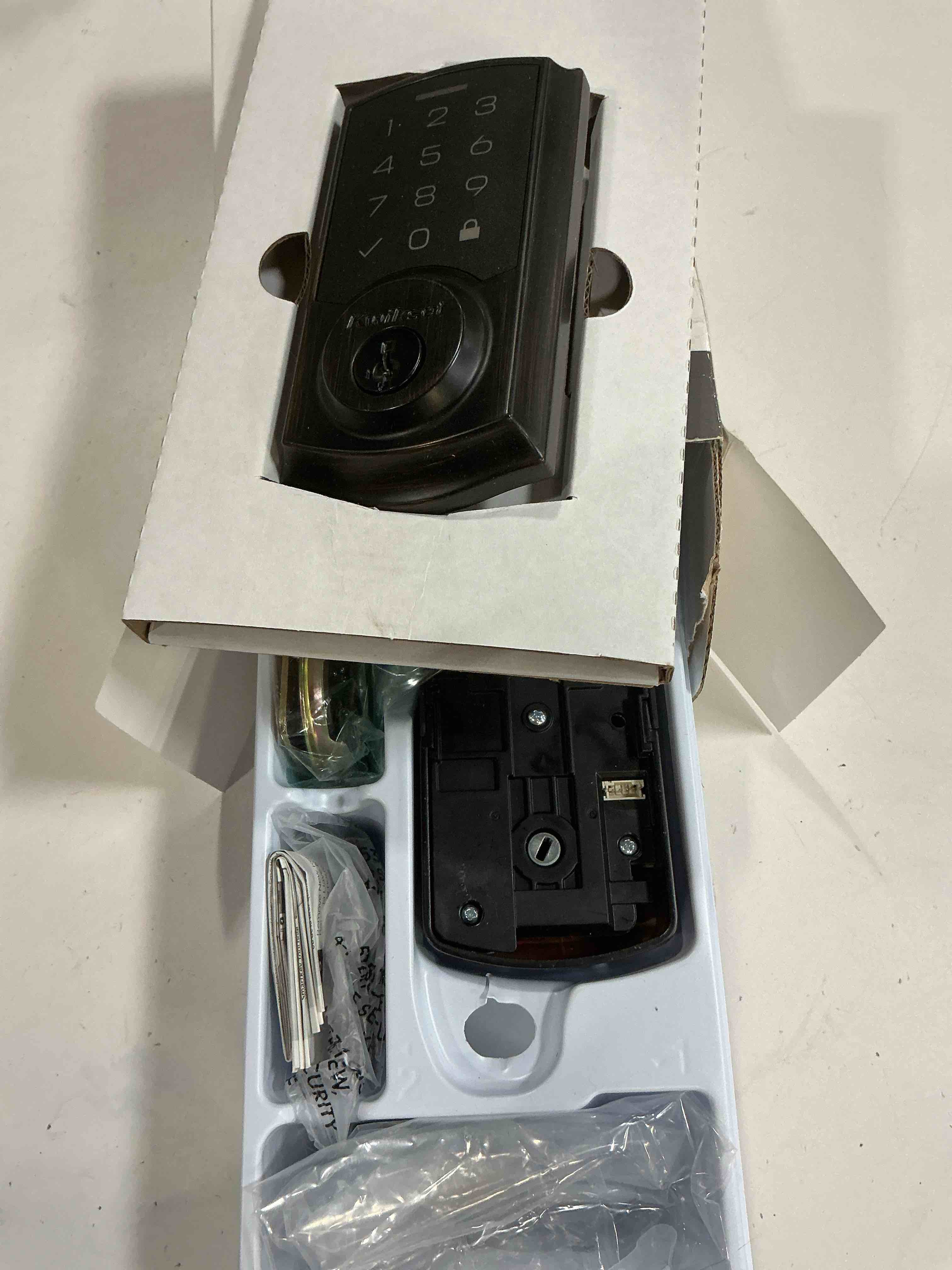 Condition photo showing As Is for kwikset 9270trl-11ps traditional smartcode touchpad electronic deadbolt smartkey venetian bronze finish
