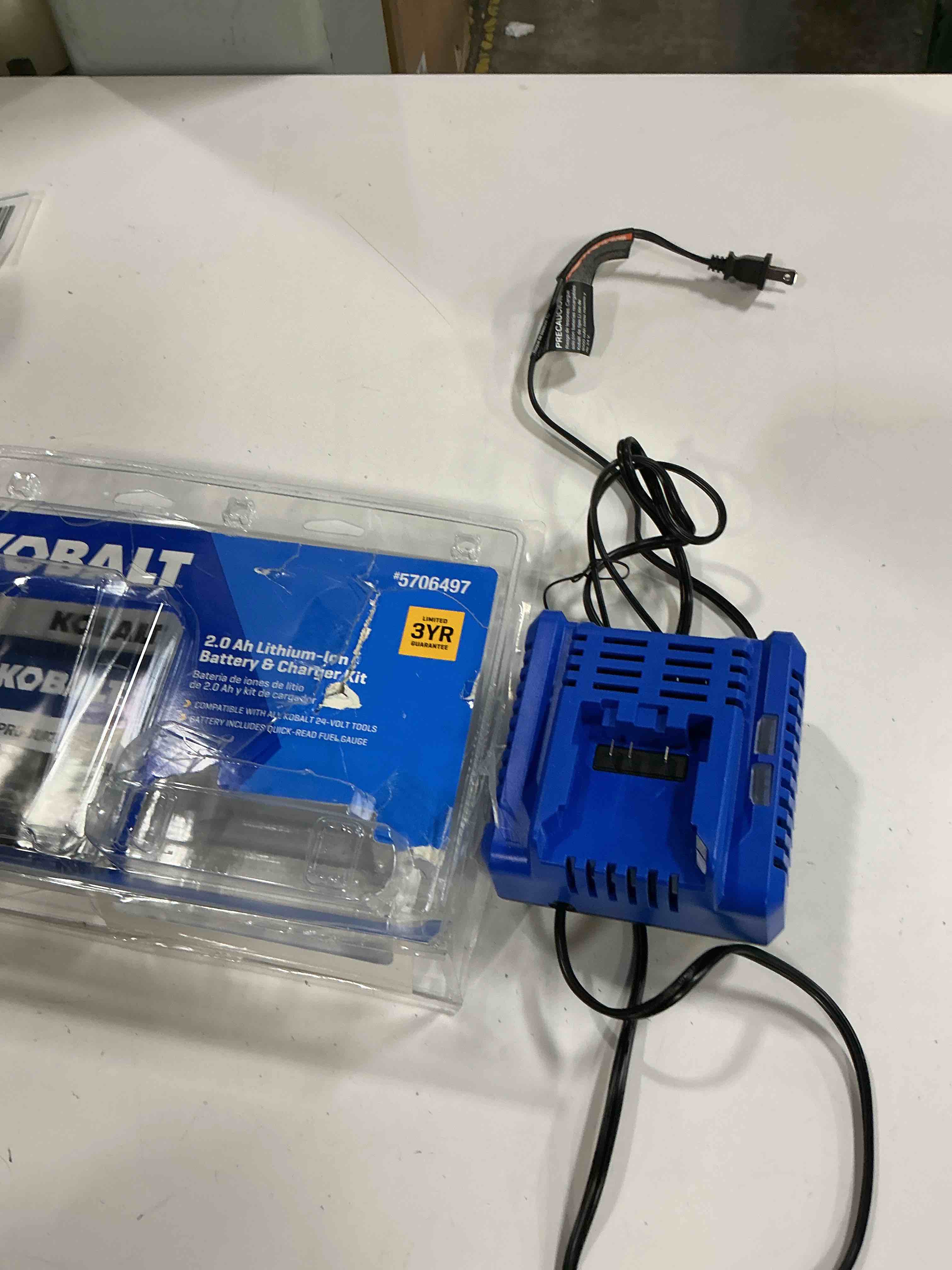 Condition photo showing As Is for kobalt 24 -volt 1 -pack lithium-ion ( 2 ah battery and charger ) (missing battery)