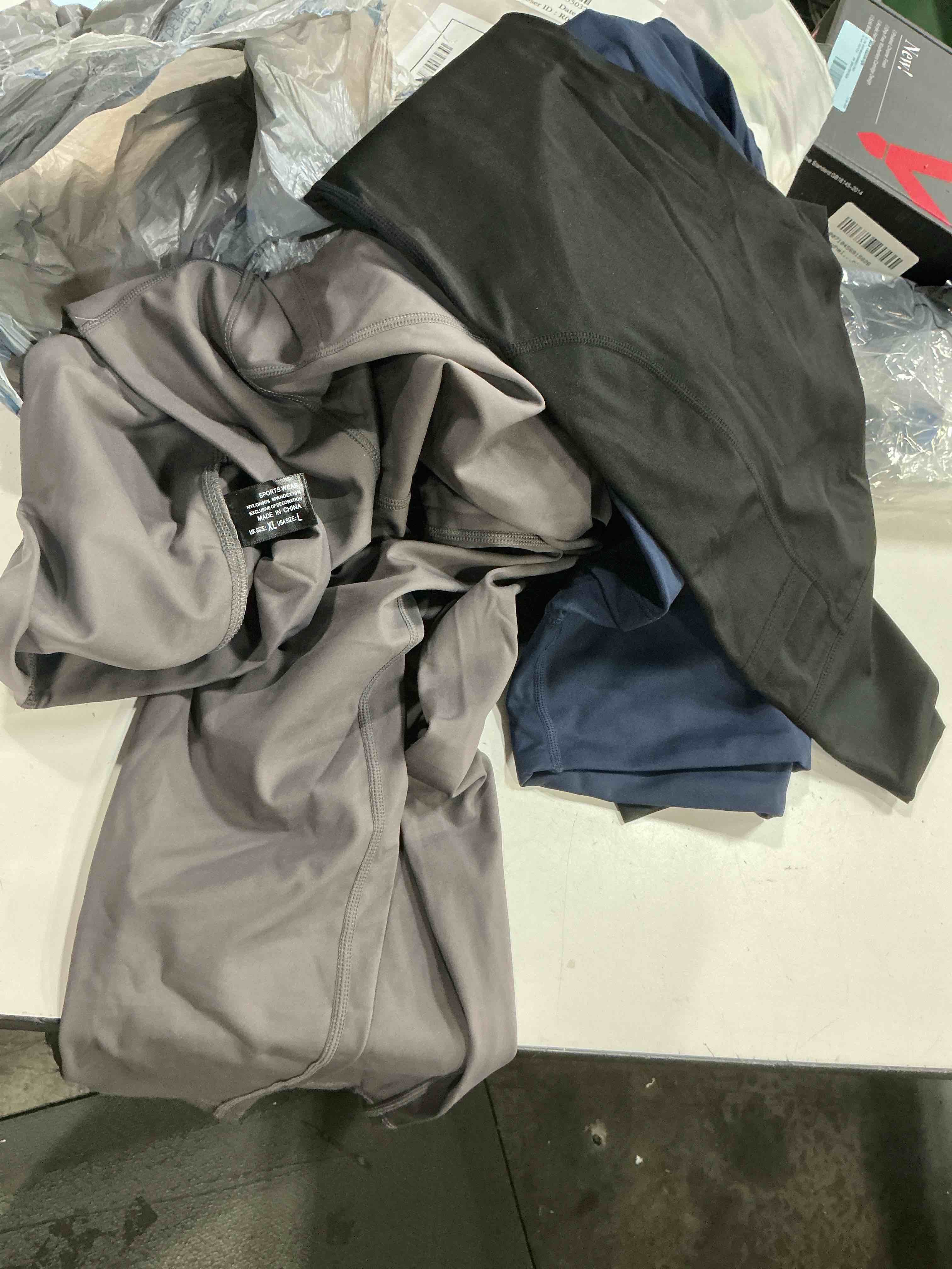Condition photo showing Good Condition for 3 pack yoga pants, size large 