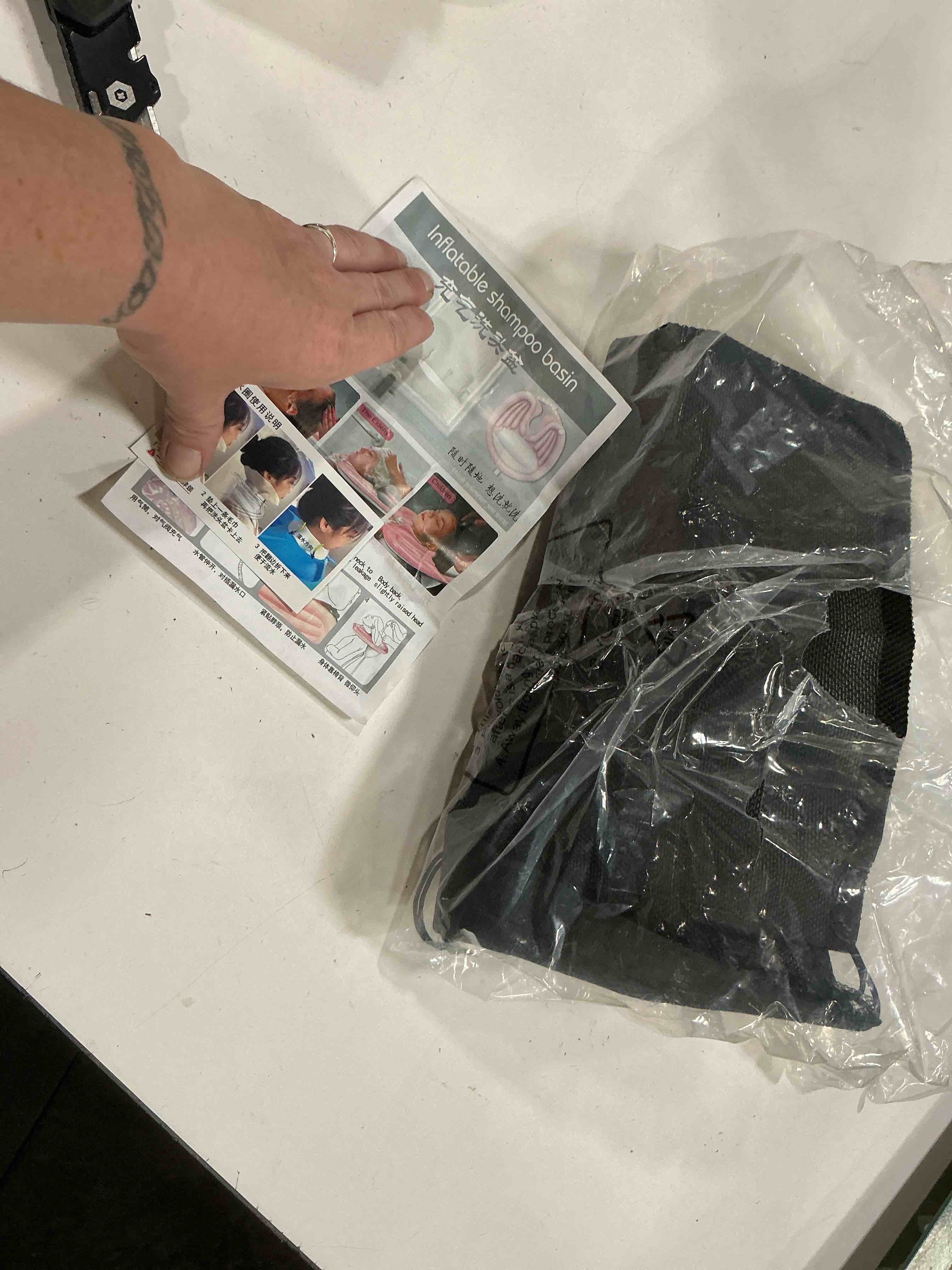 Condition photo showing As Is for inflatable shampoo basin