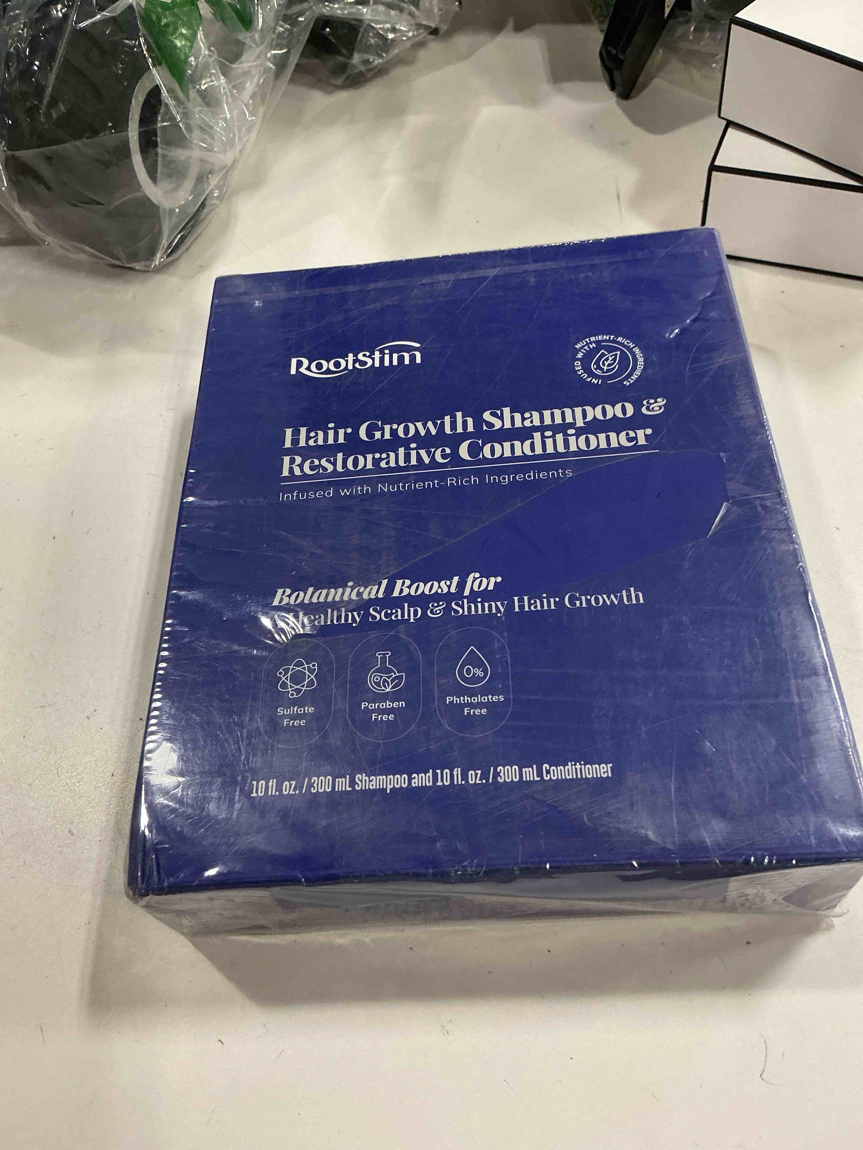 Condition photo showing New/Like New for hair growth shampoo and conditioner set