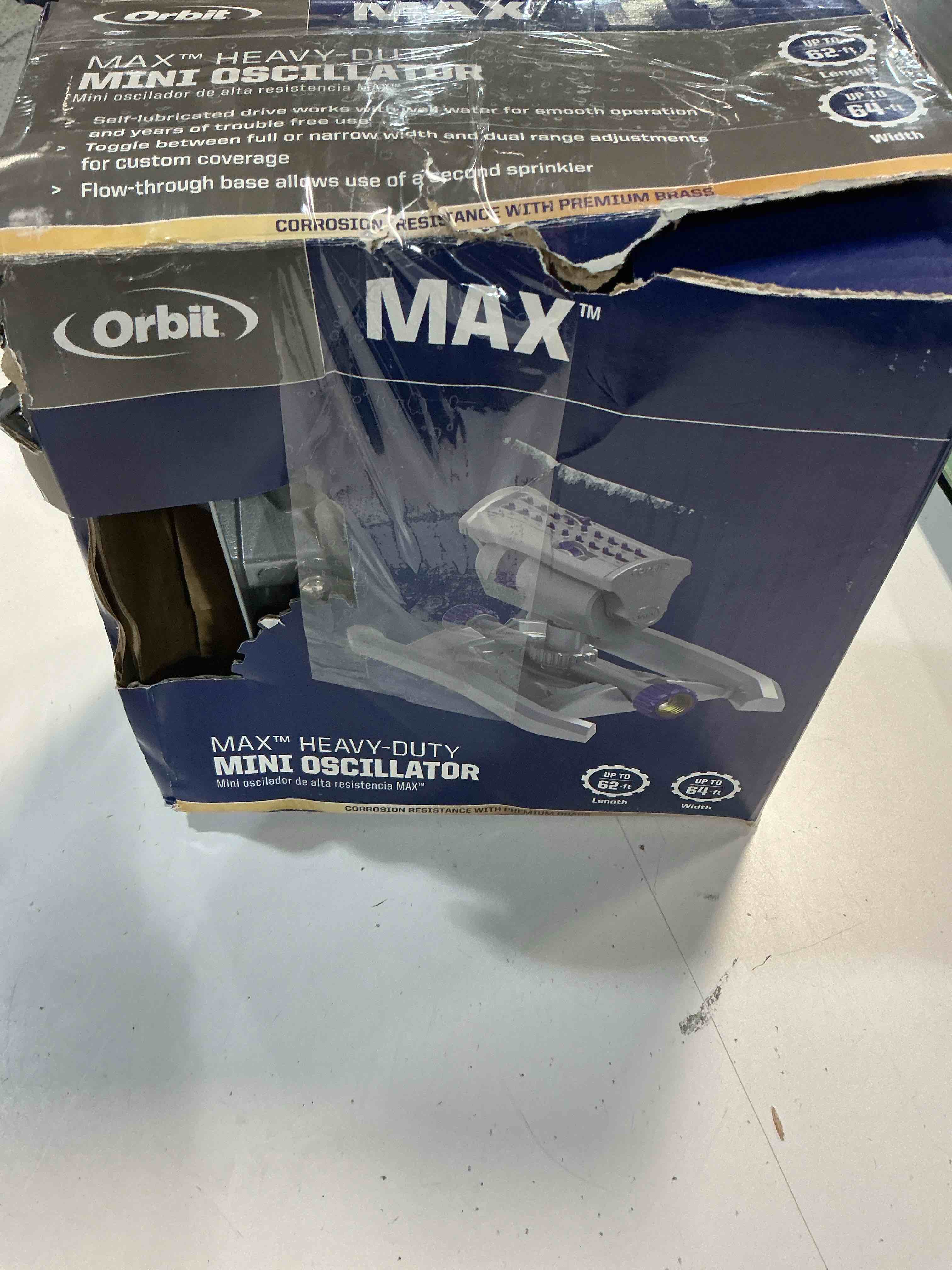 Condition photo showing As Is for orbit max 3900-sq ft oscillating sled lawn sprinkler