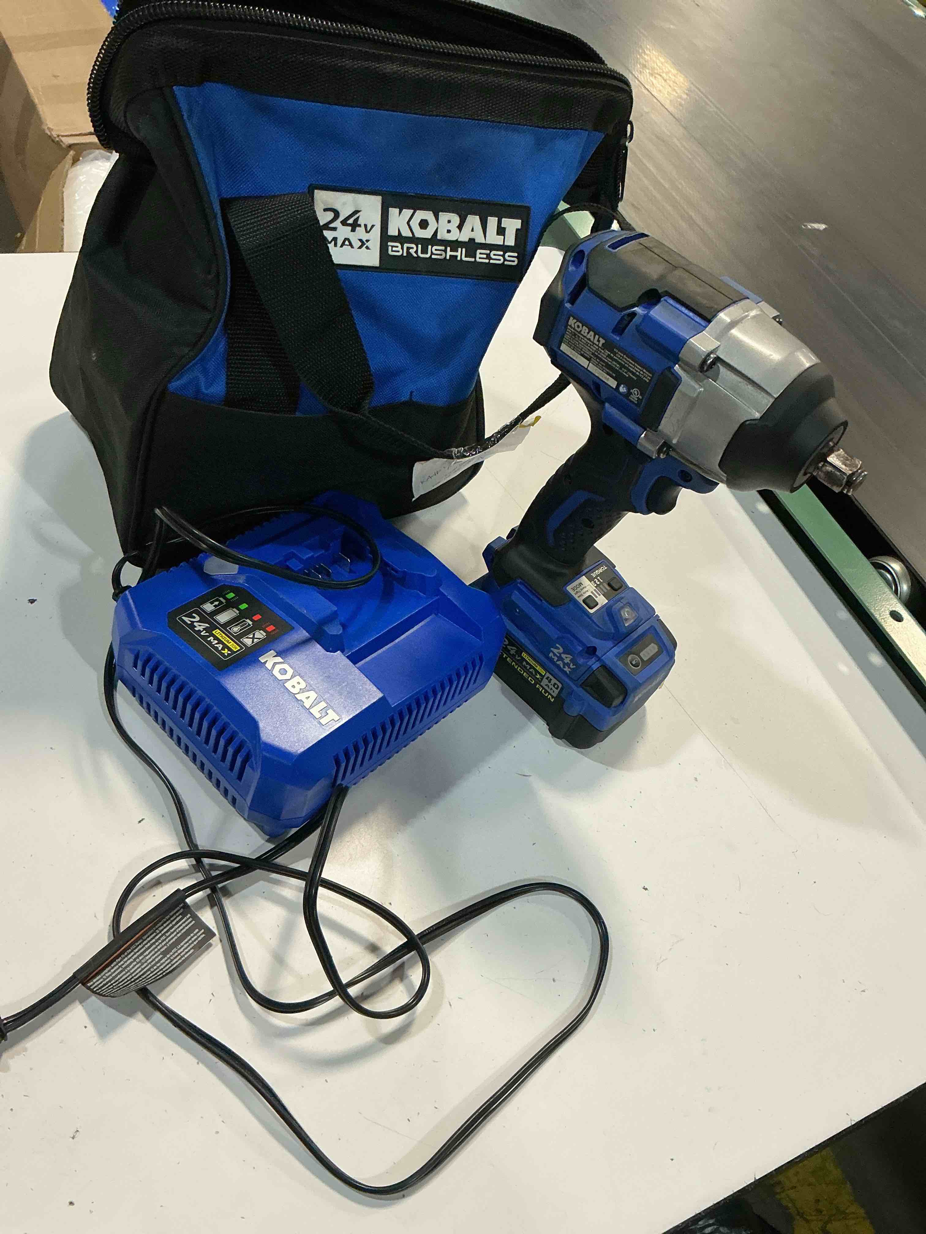 Condition photo showing As Is for kobalt 24-volt max lithium ion (li-ion) 1/2-in cordless brushless drill with battery and soft case