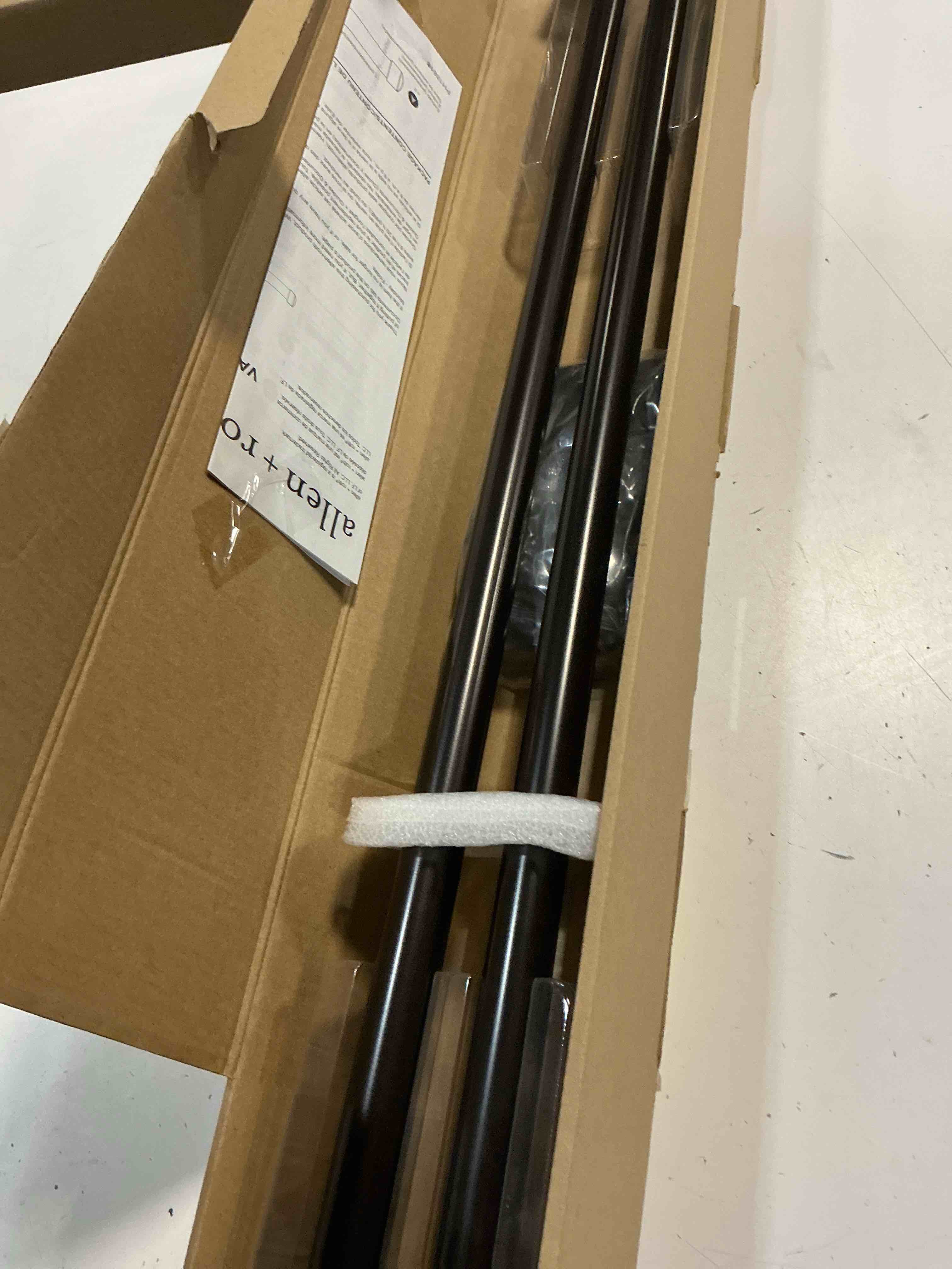 Condition photo showing New/Like New for allen + roth cromley 36-in to 72-in matte black steel side single curtain rod