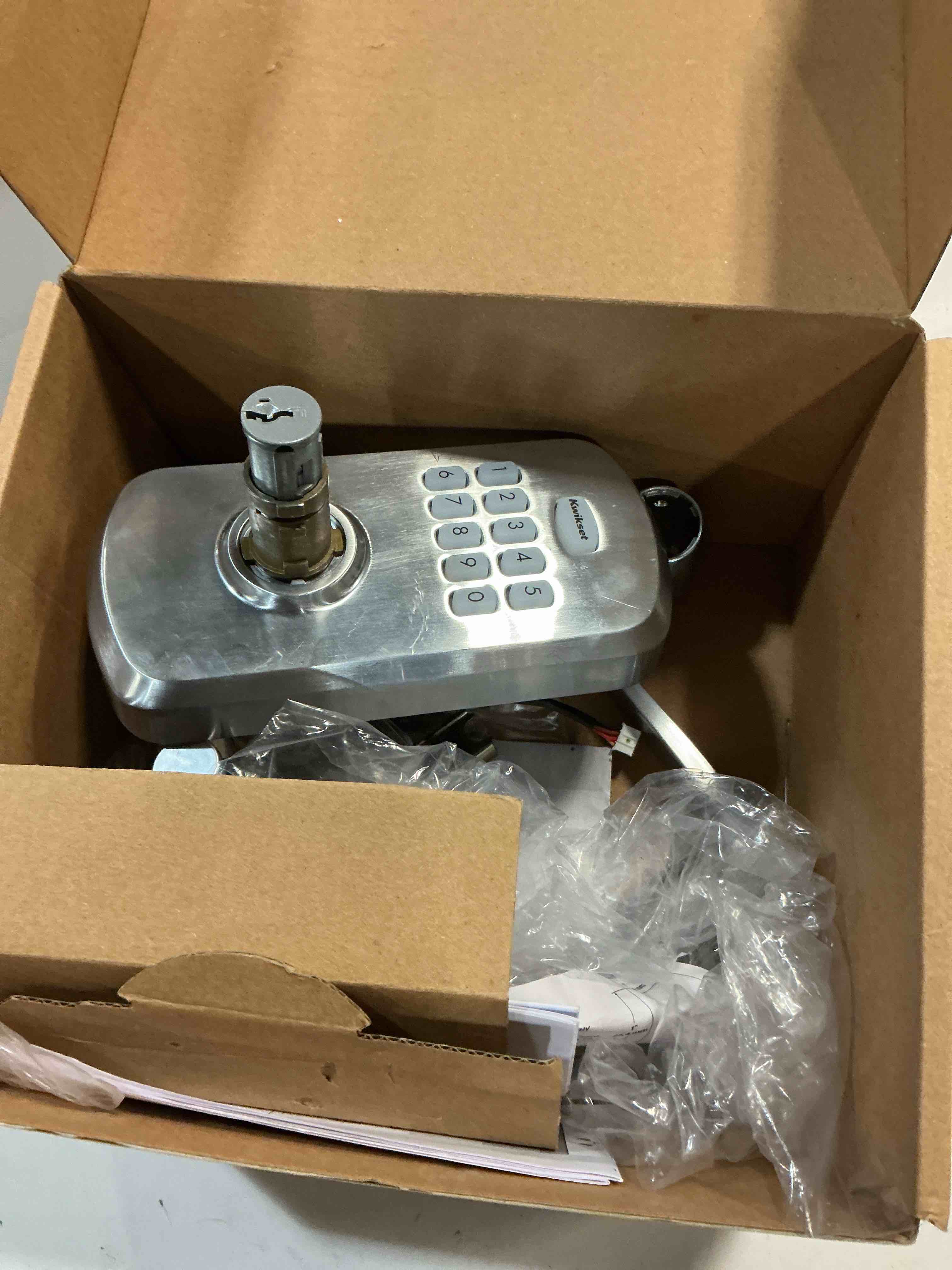 Condition photo showing As Is for kwikset 955knl-s smartcode 955 electronic keypad entry leverset with kingston lever - satin chrome