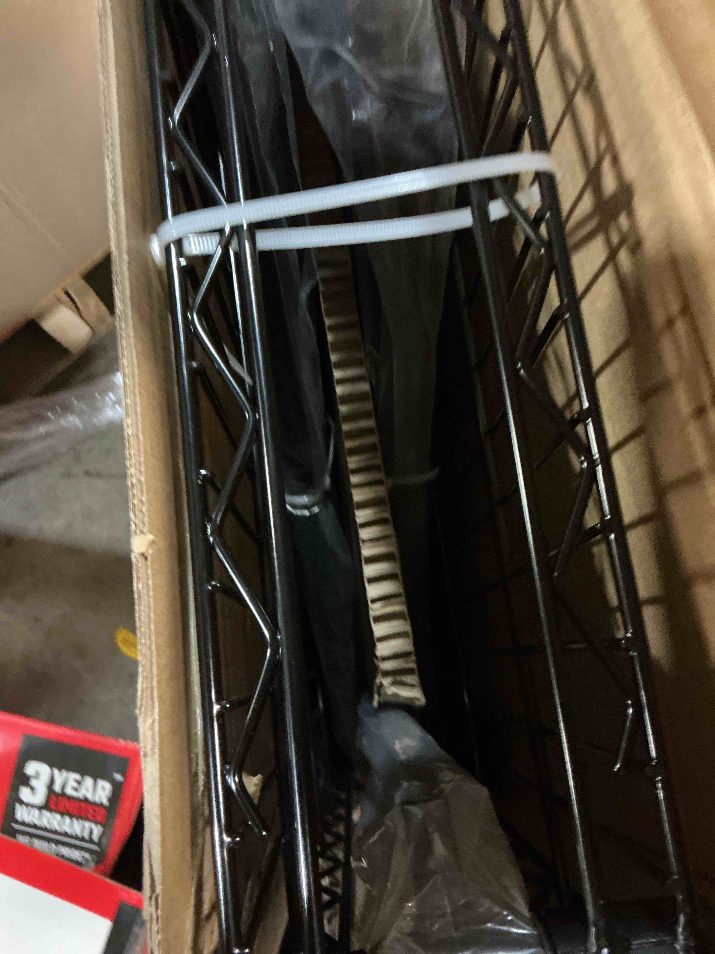 Condition photo showing As Is for project source 5-tier storage tote rack (missing parts)