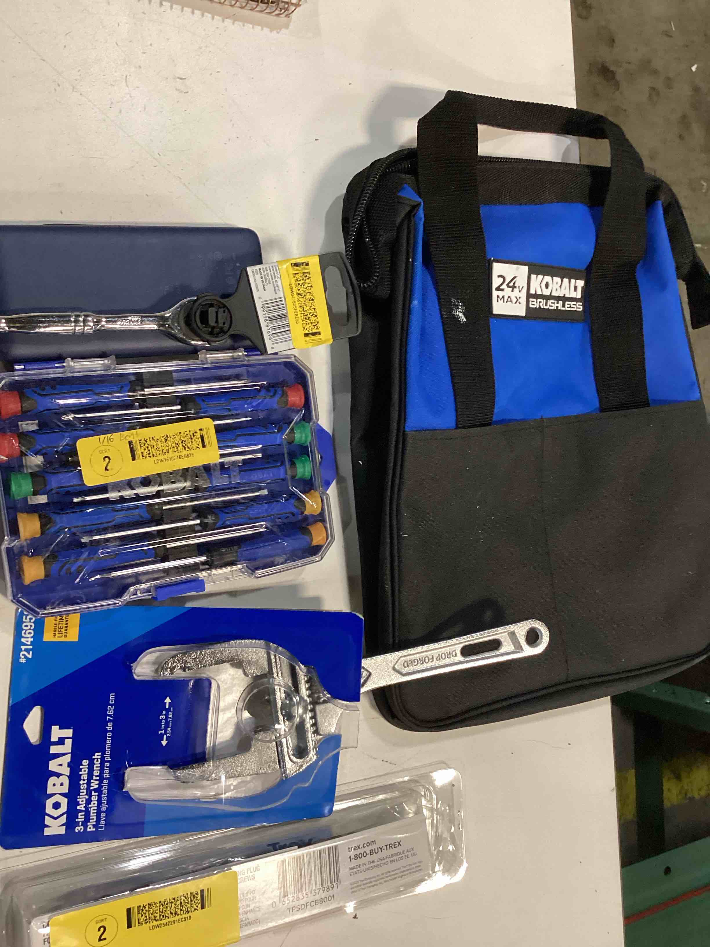 Condition photo showing As Is for assorted home improvement lot (small tools, screw, home accessories, etc.)