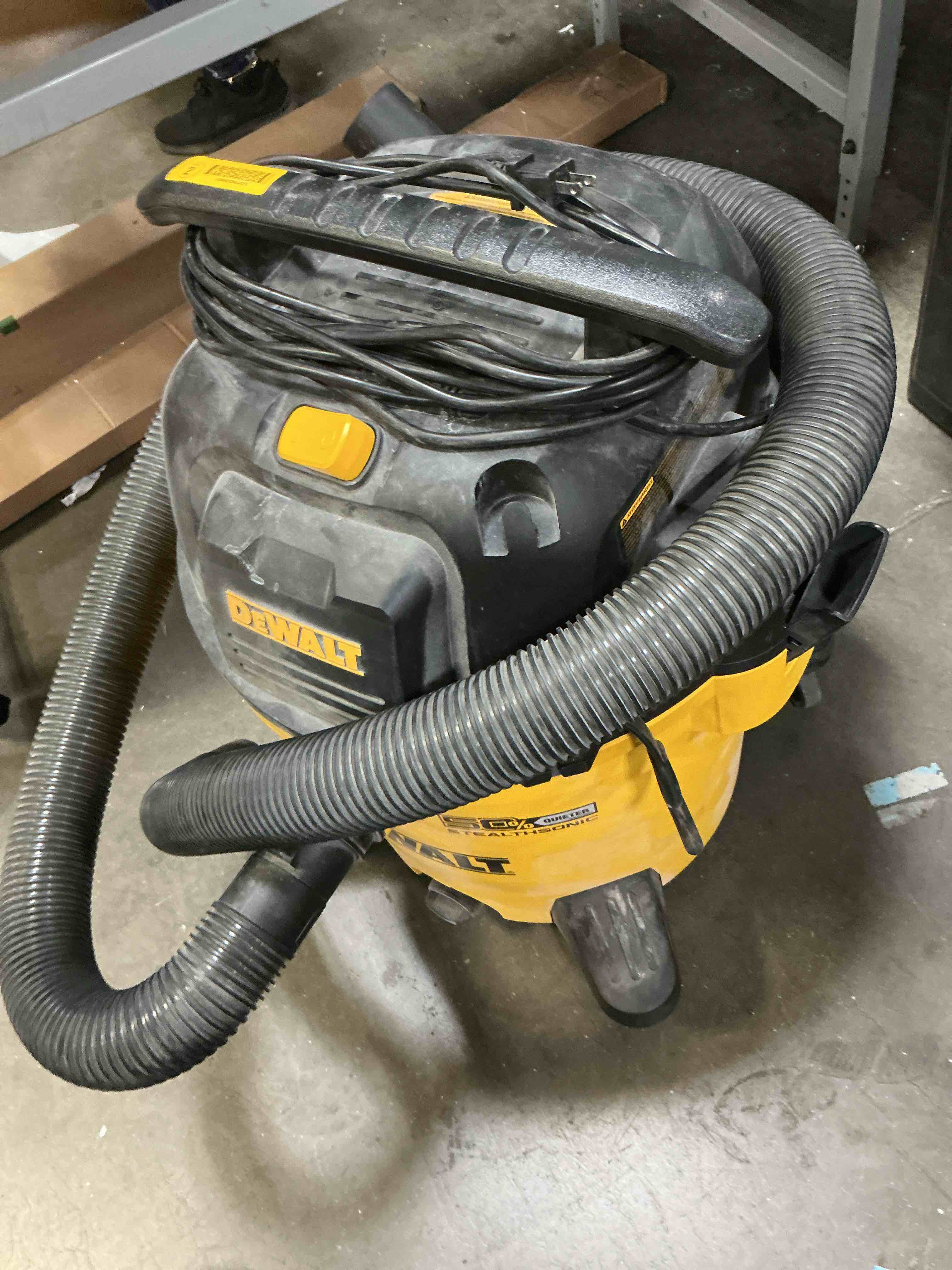 Condition photo showing As Is for dewalt stealthsonic quiet 12-gallon 5.5 hp corded wet/dry shop vacuum with accessories