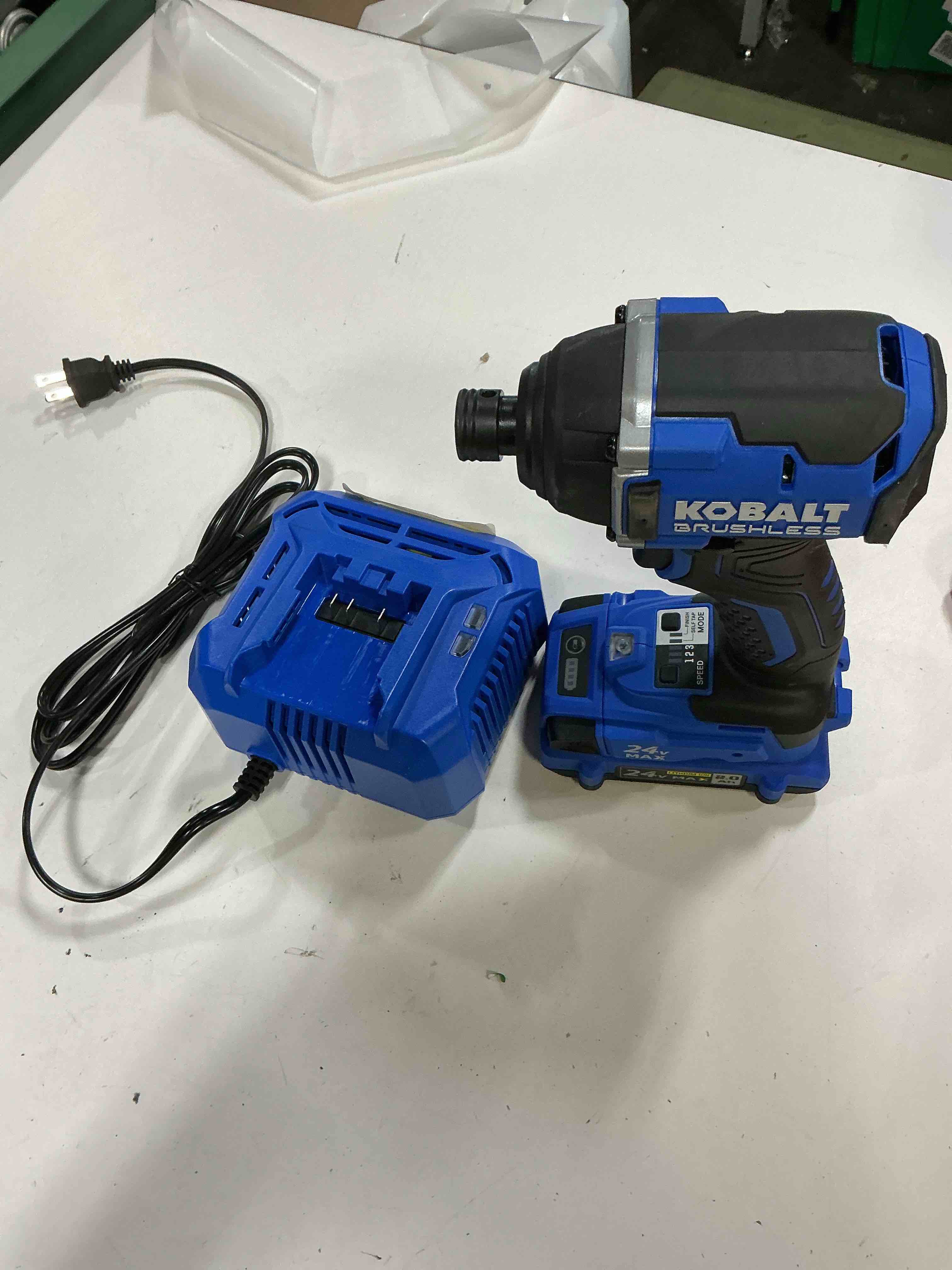 Condition photo showing As Is for ( incomplete) kobalt 24-volt 1/4-in brushless cordless impact driver  included  charger 