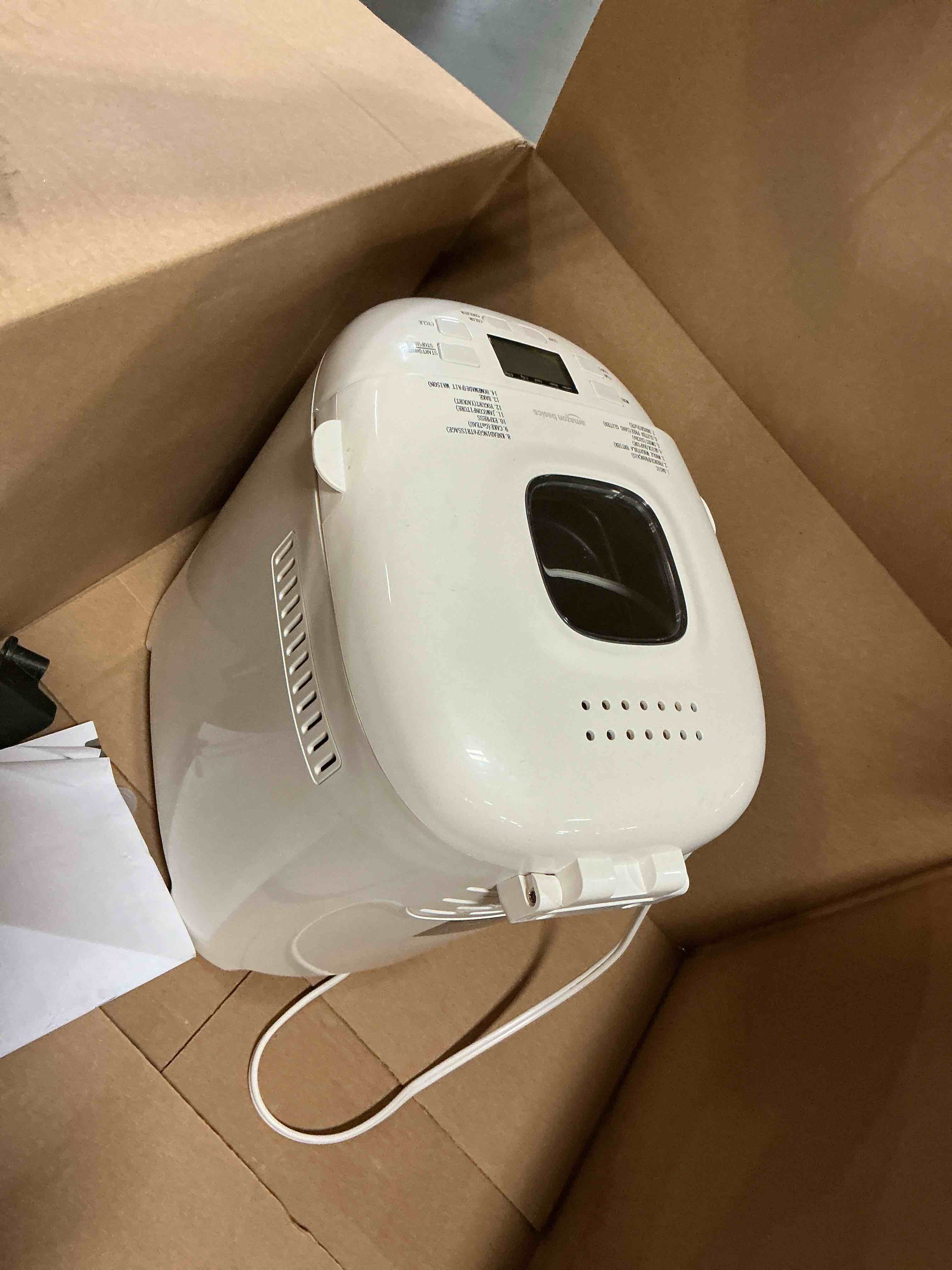 Condition photo showing As Is for amazon basics programmable bread maker, 2 pound non-stick automatic bread making machine, 14 settings for breads, doughs, gluten-free options and more, lcd display, white