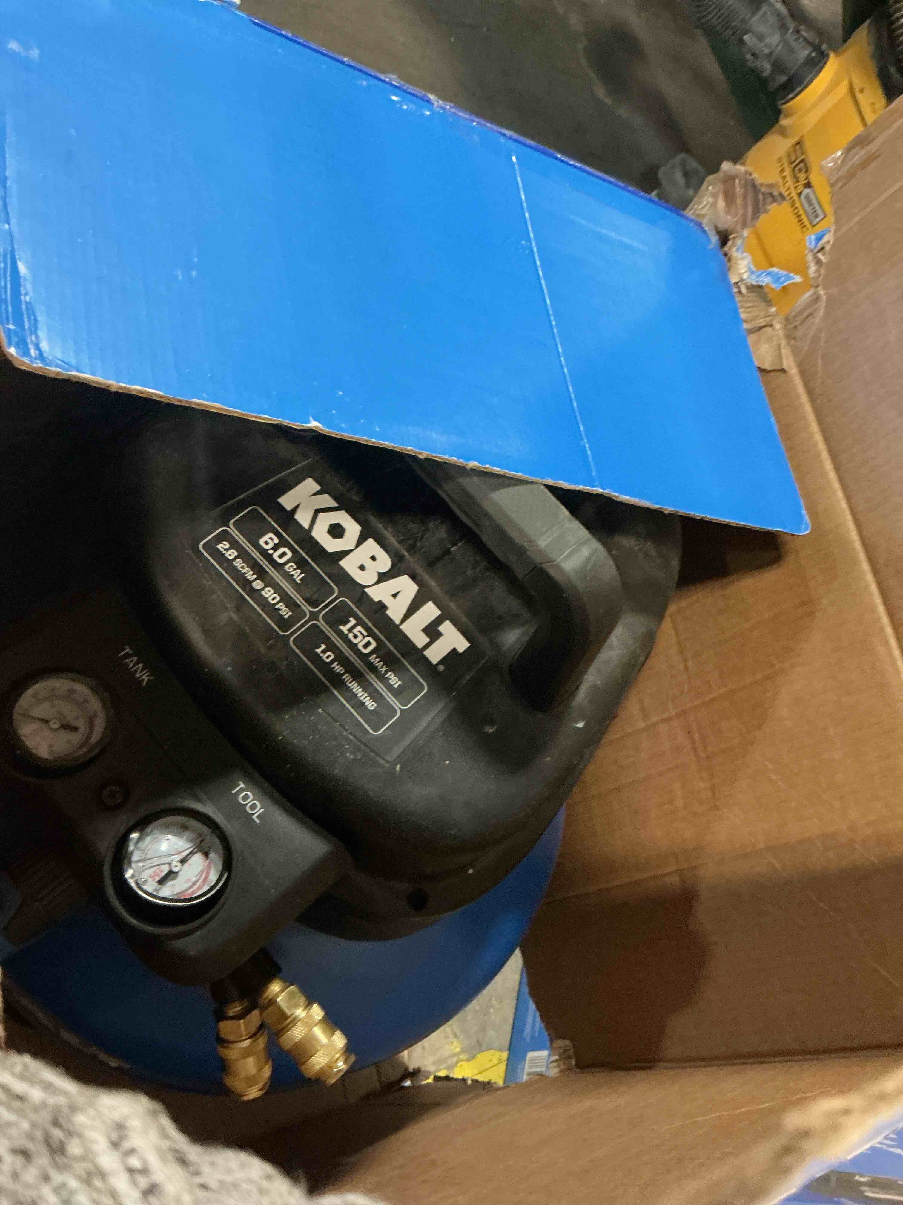 Condition photo showing As Is for kobalt 6-gallon portable electric 150 psi pancake air compressor with accessories included