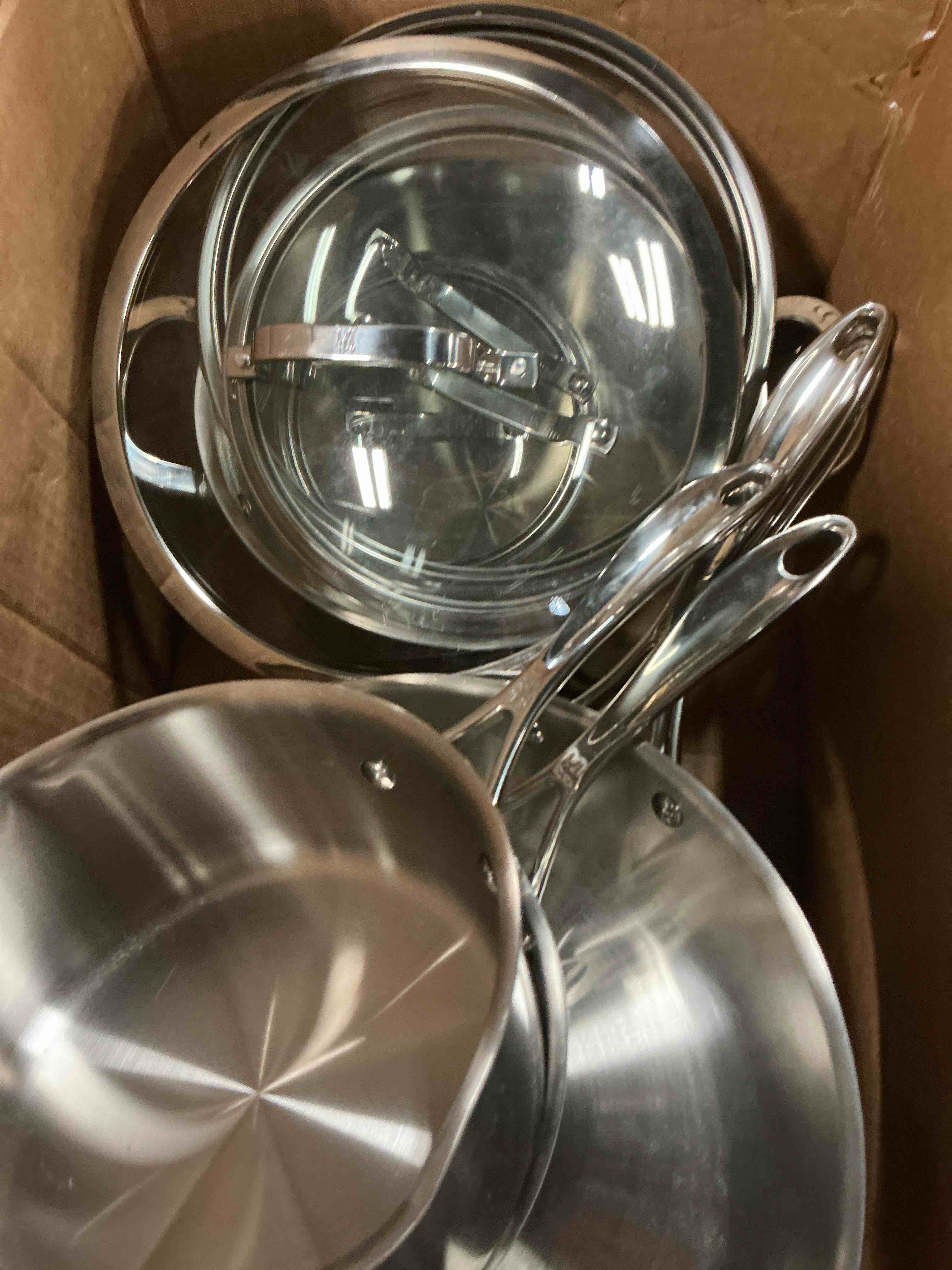 Condition photo showing As Is for henckels 11-piece stainless steel tri-ply clad cookware set