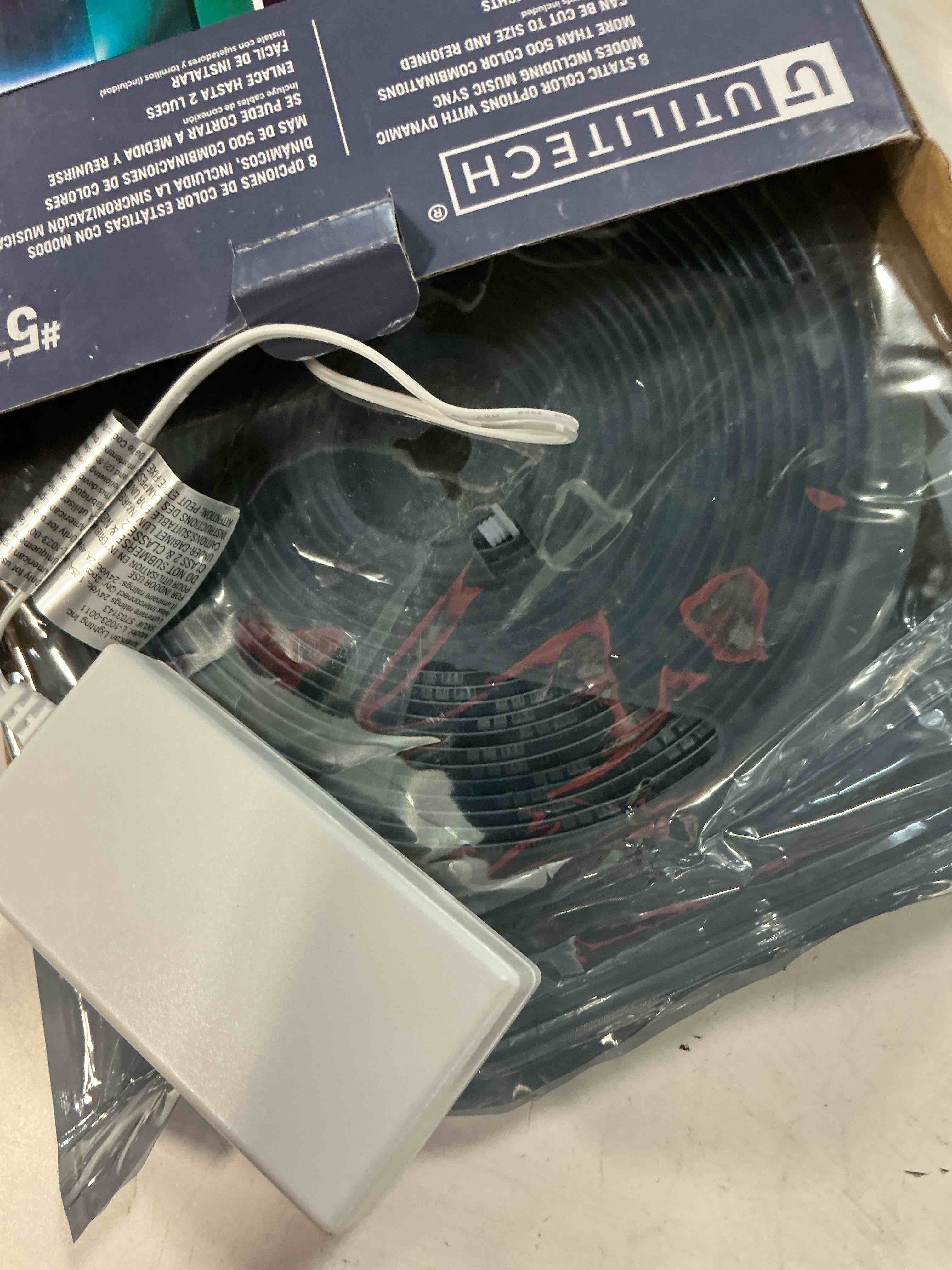 Condition photo showing As Is for utilitech indoor 16-ft led switchable white strip light