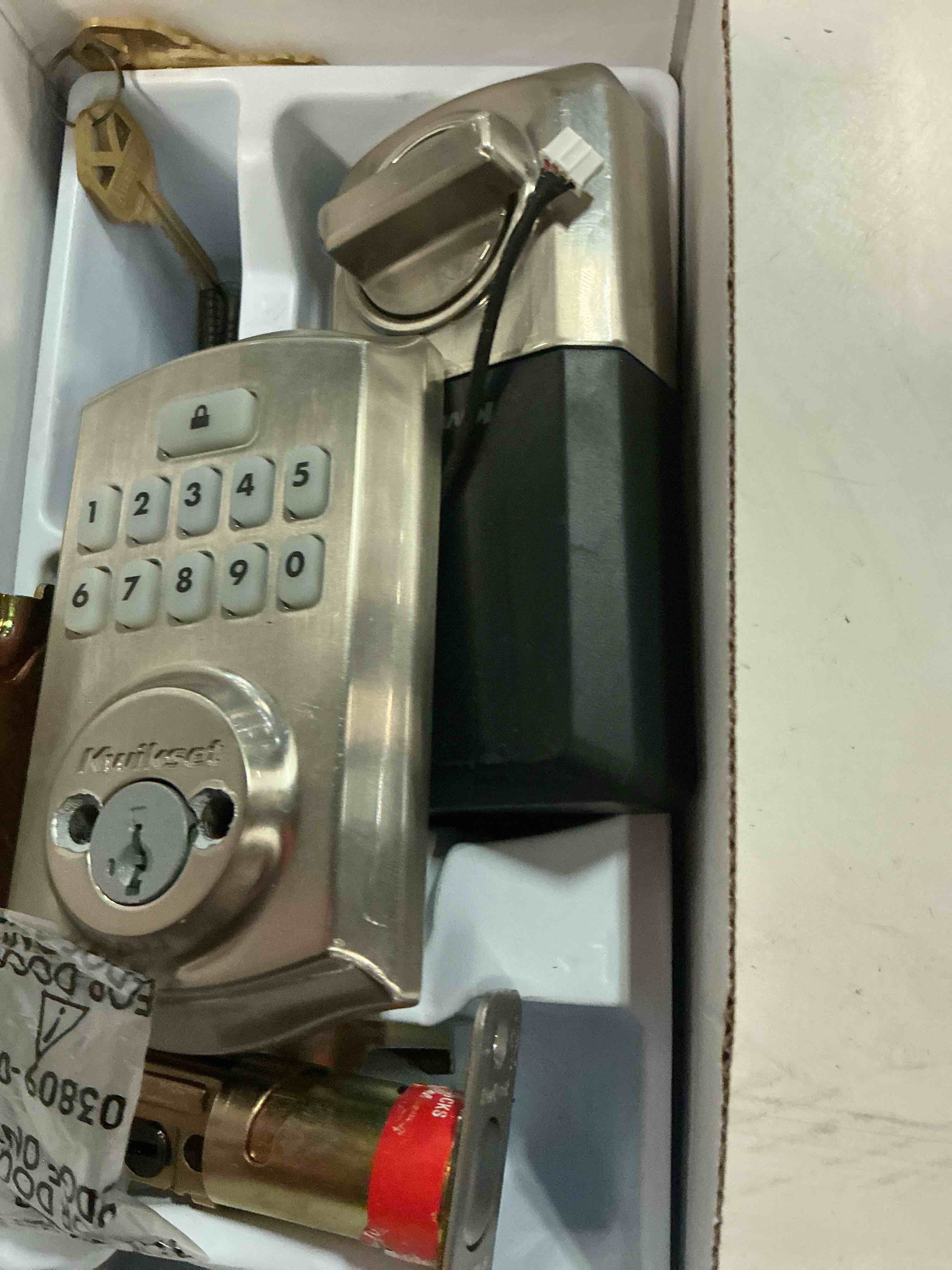 Condition photo showing As Is for kwikset 9260trl-15s traditional smartcode keypad electronic deadbolt smartkey satin nickel finish