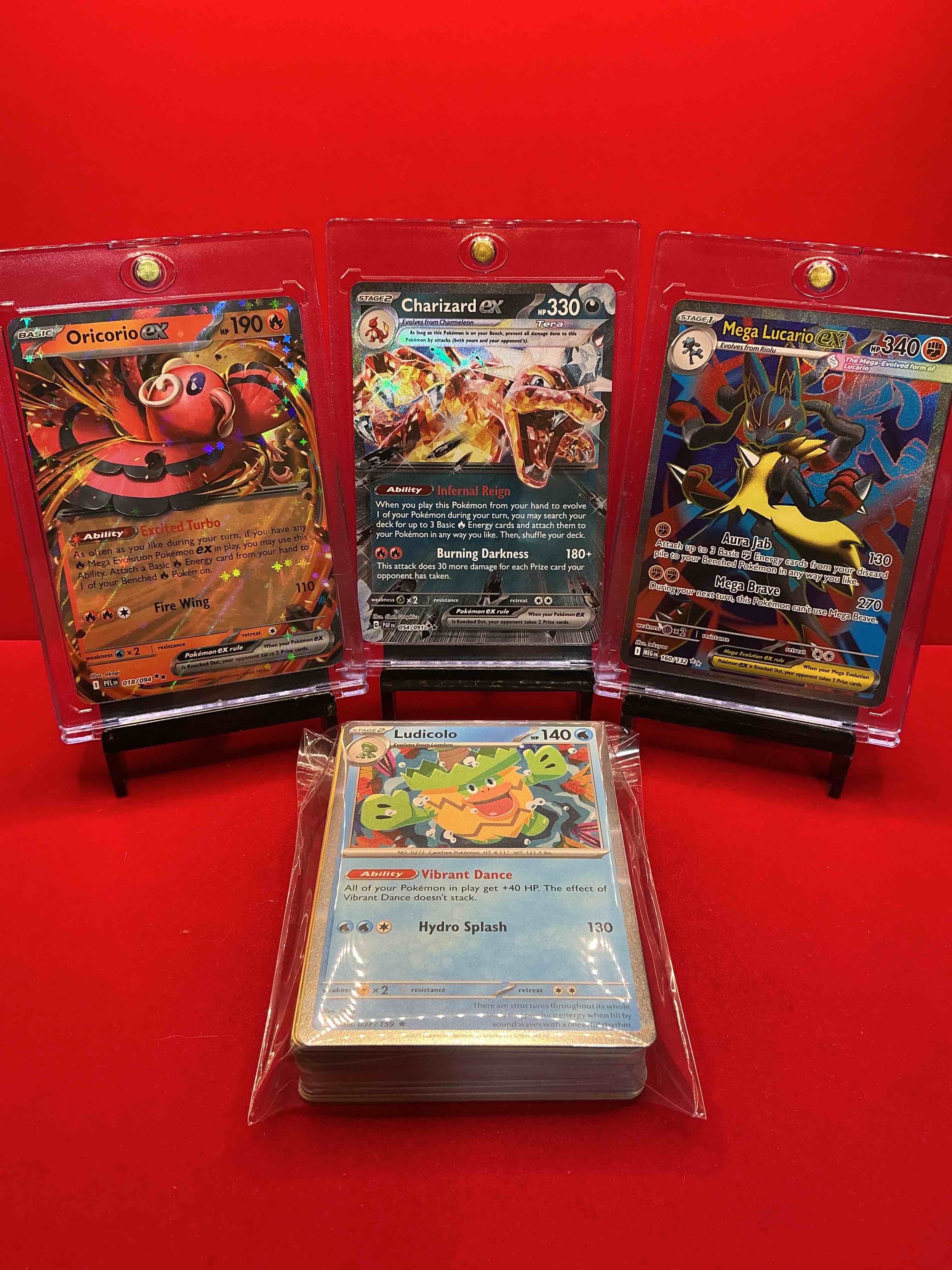 pokémon pack! charizard ex! oricorio ex! mega lucario ex! along with 50 other pokémon heroes, holos, legends & commons- including holographic cards, stage 2 card, holos in many forms & more! also includes non holo common/ uncommon basic & first stage cards & maybe even trainers & energy too! perfect set for collectors & enthusiasts!
