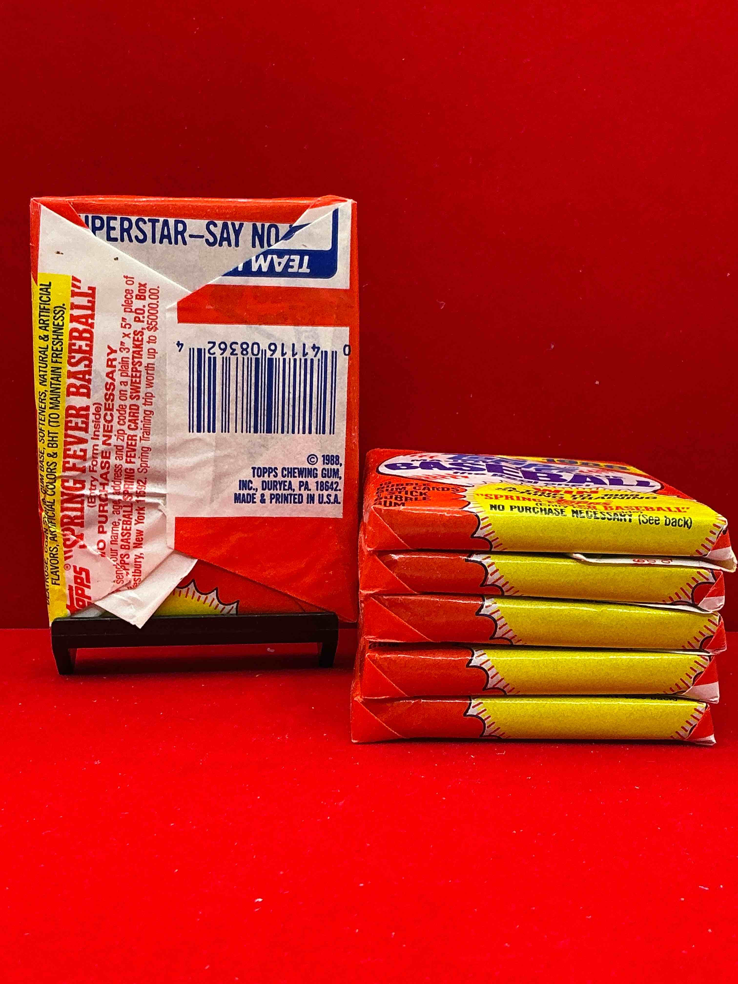 Condition photo showing New/Like New for 80's baseball fan's rejoice! 1988 topps baseball unopened wax packs full of collectible trading cards! search for valuable don mattingly "world of baseball" & nolan ryan cards worth hundreds in perfect condition!