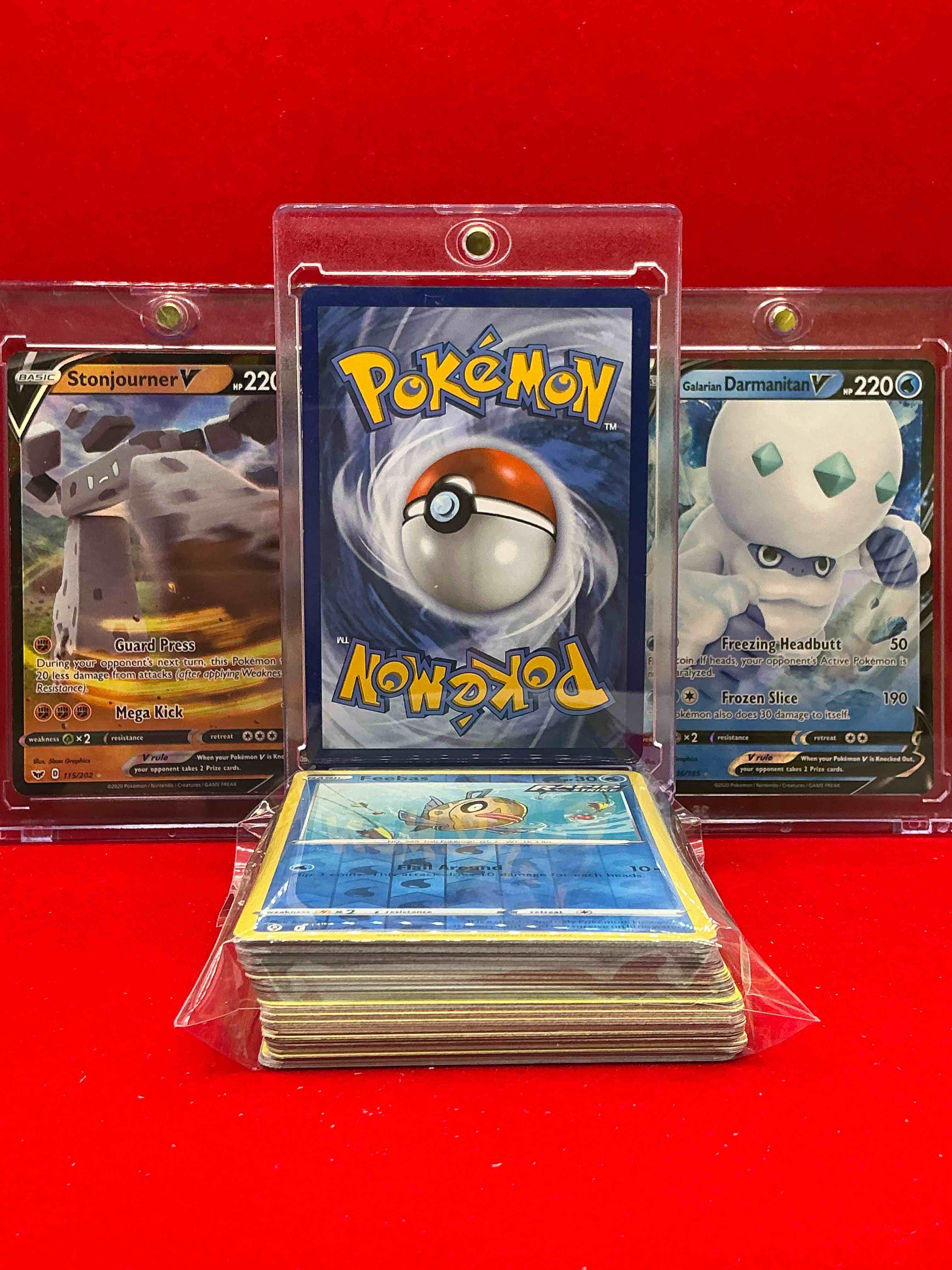 Condition photo showing New/Like New for charizard v! stonjourner v, darmanitan v & more!  along with 50 other pokémon heroes, holos, legends & commons- including holographic cards, stage 2 cards, holos in all forms & more! also includes 36 non holo common/ uncommon basic & first stage cards trainers & energy too! perfect set for collectors & enthusiasts!