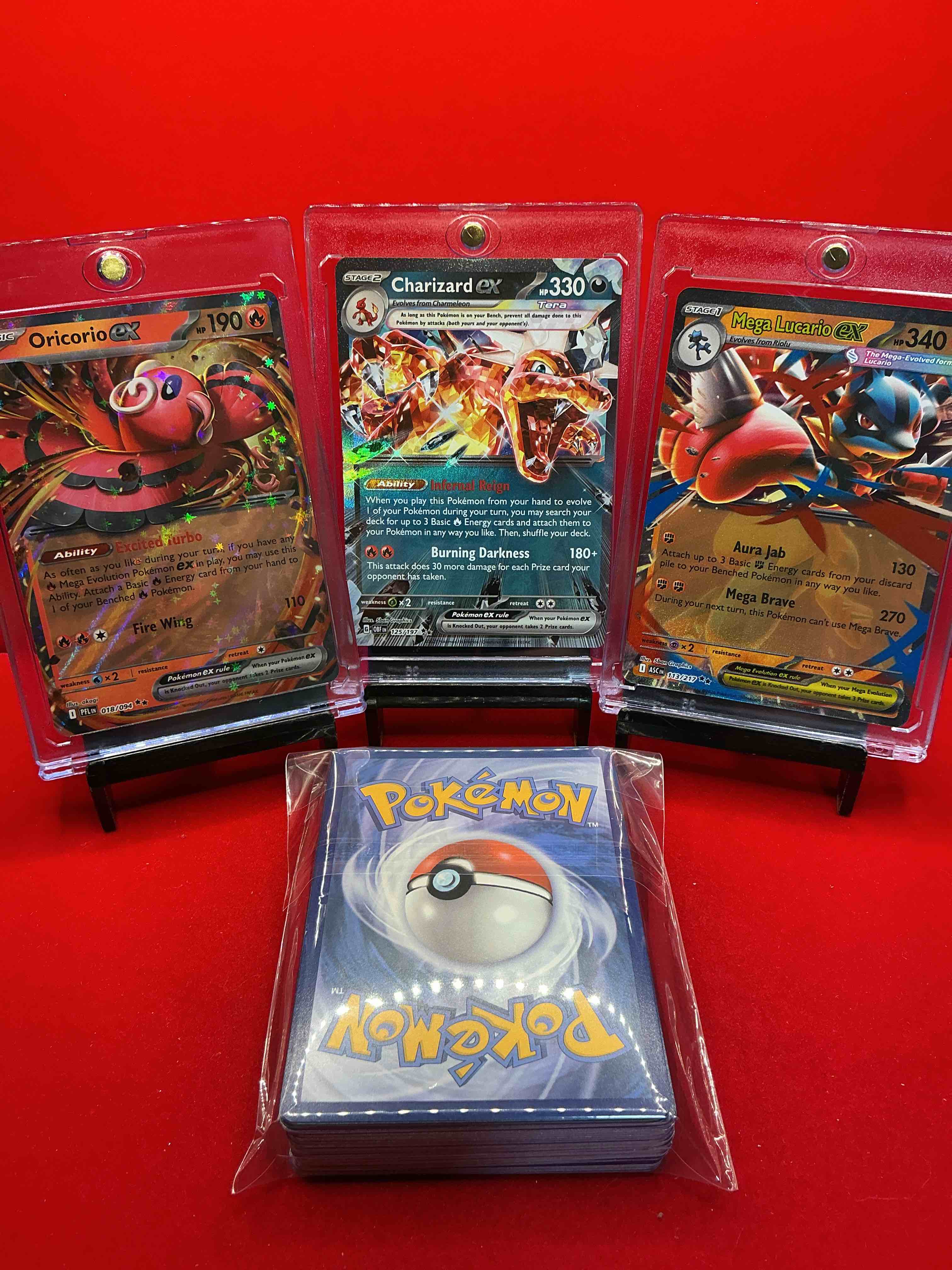 Condition photo showing New/Like New for pokémon! charizard ex! oricorio ex! mega lucario ex! along with 50 other pokémon heroes, holos, legends & commons- including holographic cards, stage 2 card, holos in many forms & more! also includes non holo common/ uncommon basic & first stage cards & maybe even trainers & energy too! perfect set for collectors & enthusiasts!