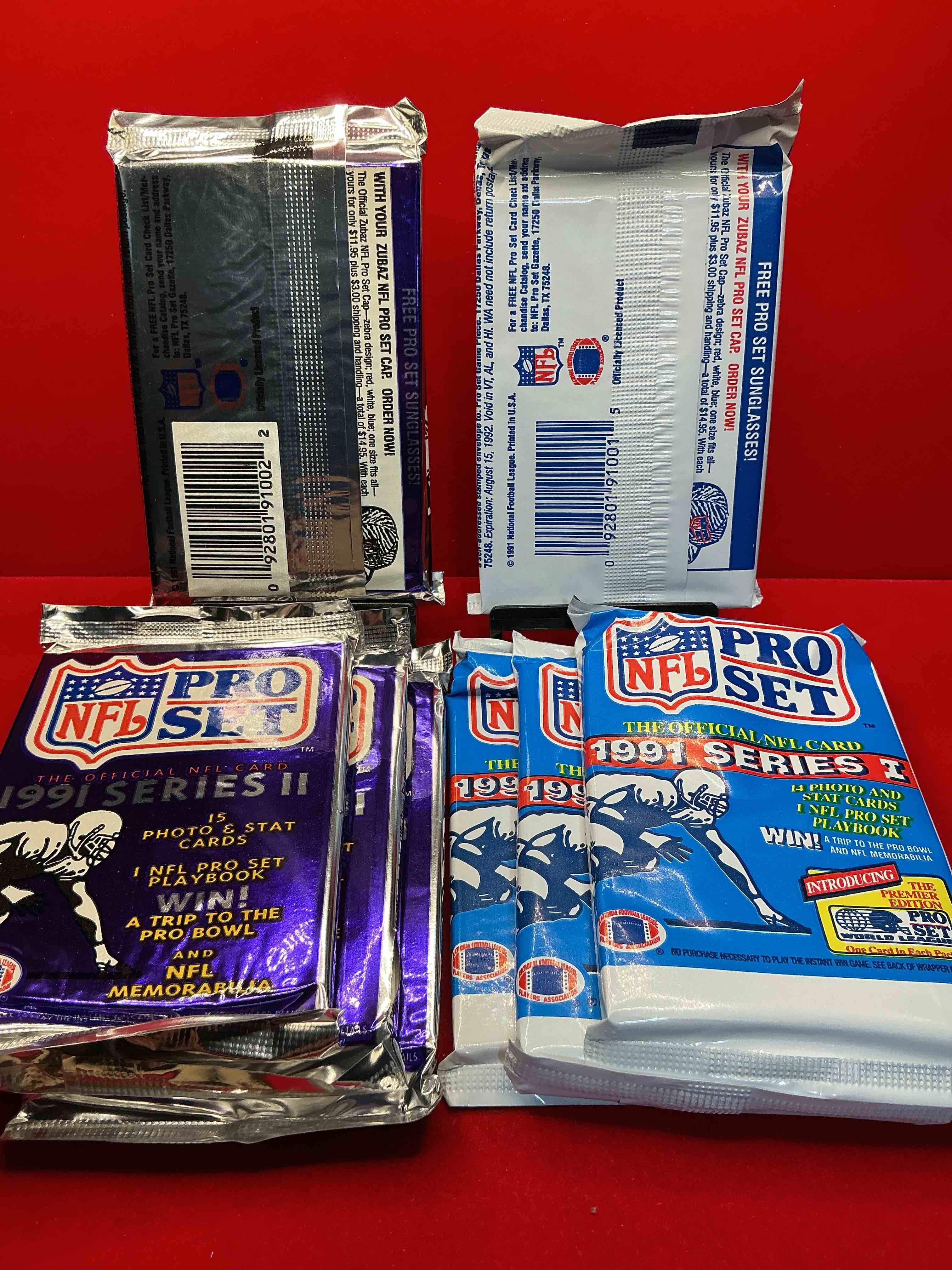 Condition photo showing New/Like New for wow! 1991 pro set football sealed card packs series i & ii, direct from original retail case!highly sought after by collectors as this year is loaded with high profile cards!search for cards from barry sanders, deion sanders, troy aikman, michael irvin & much more! getting hard to find!