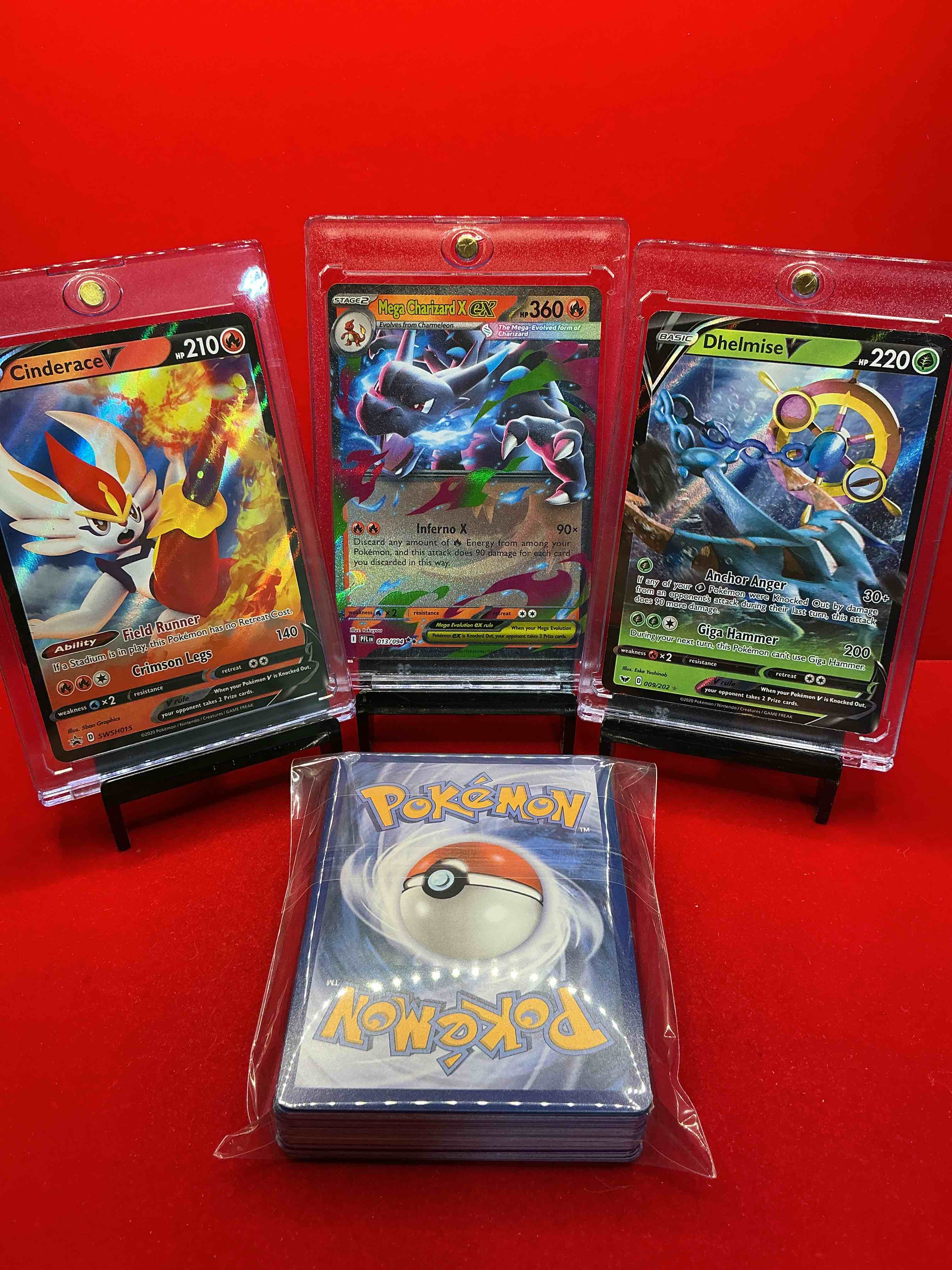 Condition photo showing New/Like New for charizard x ex! dhelmise v! cinderace v! along with 50 other pokémon heroes, holos, legends & commons- including holographic cards, stage 1 card, holos in many forms & more! also includes non holo common/ uncommon basic & first stage cards & maybe even trainers & energy too! perfect set for collectors & enthusiasts!