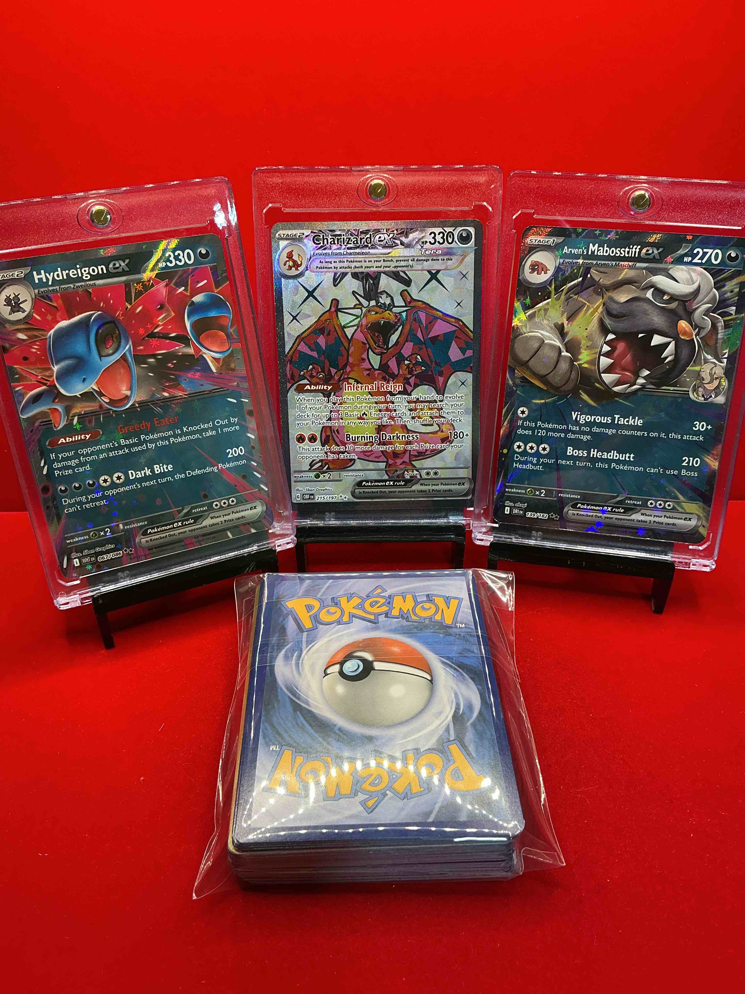 Condition photo showing New/Like New for pokémon! charizard ex! mabosstiff ex! hydreigon ex! along with 50 other pokémon heroes, holos, legends & commons- including holographic cards, stage 2 card, holos in many forms & more! also includes non holo common/ uncommon basic & first stage cards & maybe even trainers & energy too! perfect set for collectors & enthusiasts!