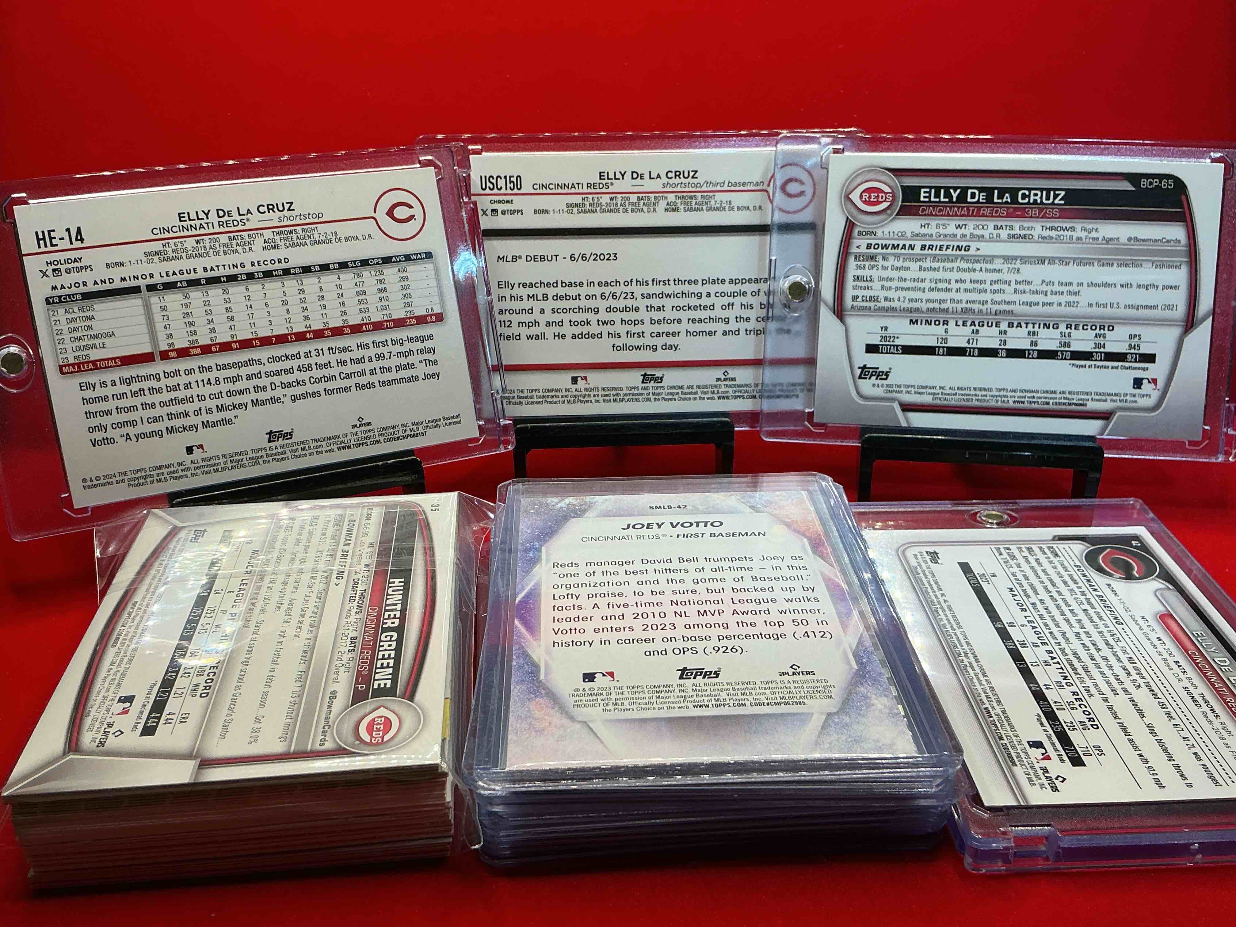 Condition photo showing New/Like New for reds fans rejoice! elly de la cruz! joey votto! tyler callihan! & more! this 50 card lot includes the biggest names on the cincinnati reds!