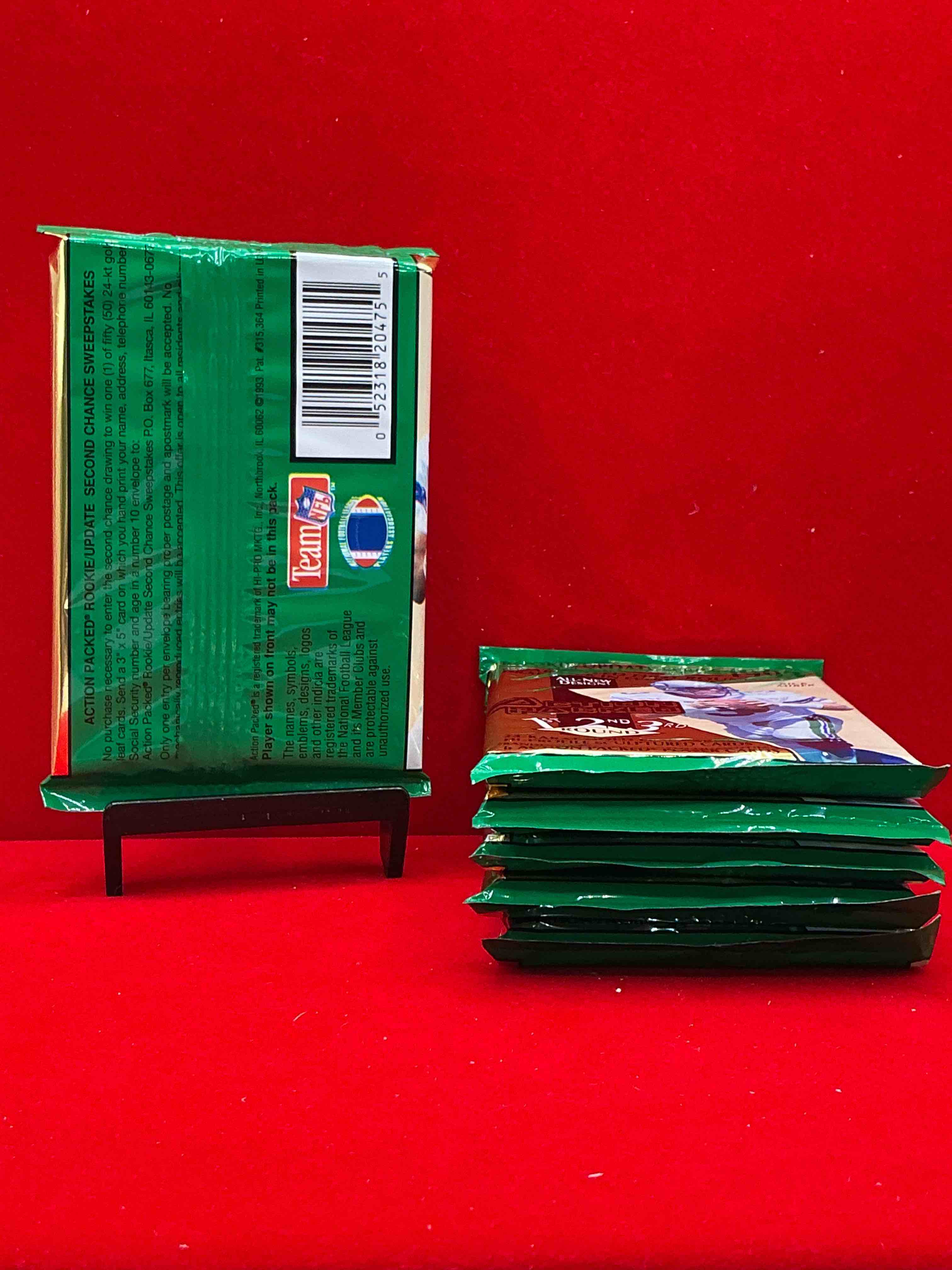 Condition photo showing New/Like New for 1993 nfl action packed rookie update series! guaranteed star card inside! possible 24k gold leaf cards! awesome nfl packs! search for stars, michael irvin, jerry rice, joe montana, bo jackson, barry sanders & more!