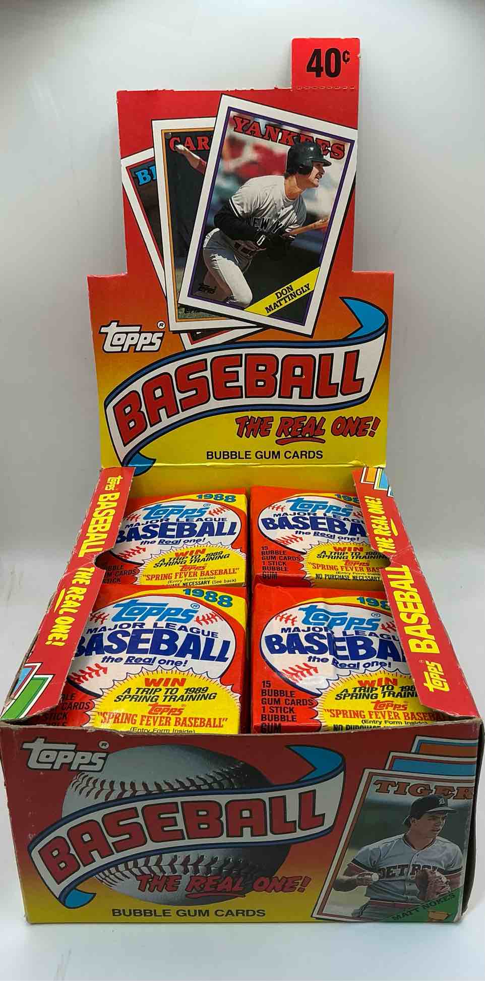 Condition photo showing New/Like New for 80's baseball fan's rejoice! 1988 topps baseball unopened wax packs full of collectible trading cards! search for valuable don mattingly "world of baseball" & nolan ryan cards worth hundreds in perfect condition!