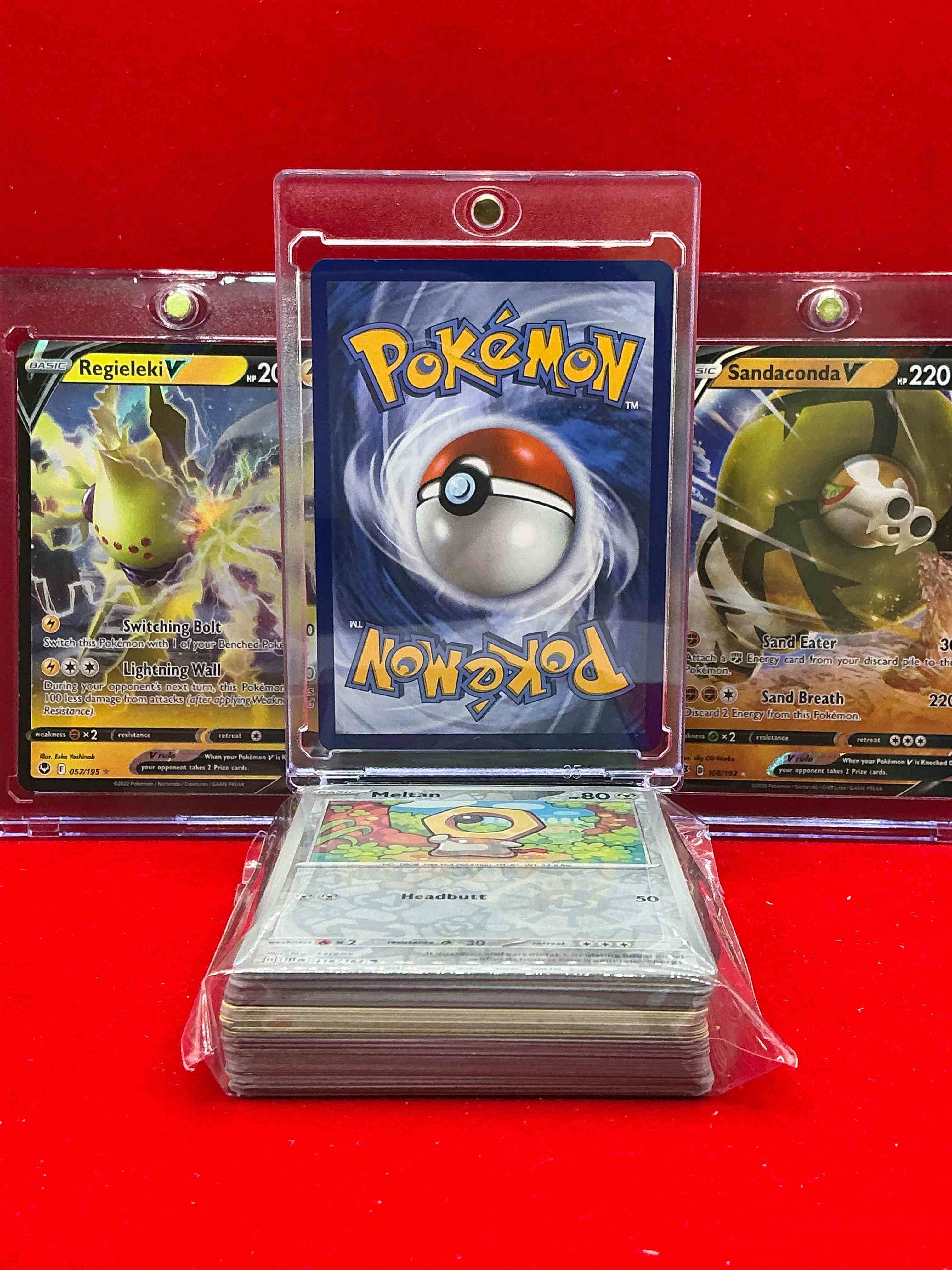 Condition photo showing New/Like New for charizard gx, regieleki v & sandaconda v! wow! pokémon palooza! along with 50 other pokémon heroes, holos, legends & commons- including holographic cards, cool holos & more! includes 36 non holo common/ uncommon basic & first stage cards & could even include trainers & energy too! perfect set for collectors & enthusiasts!