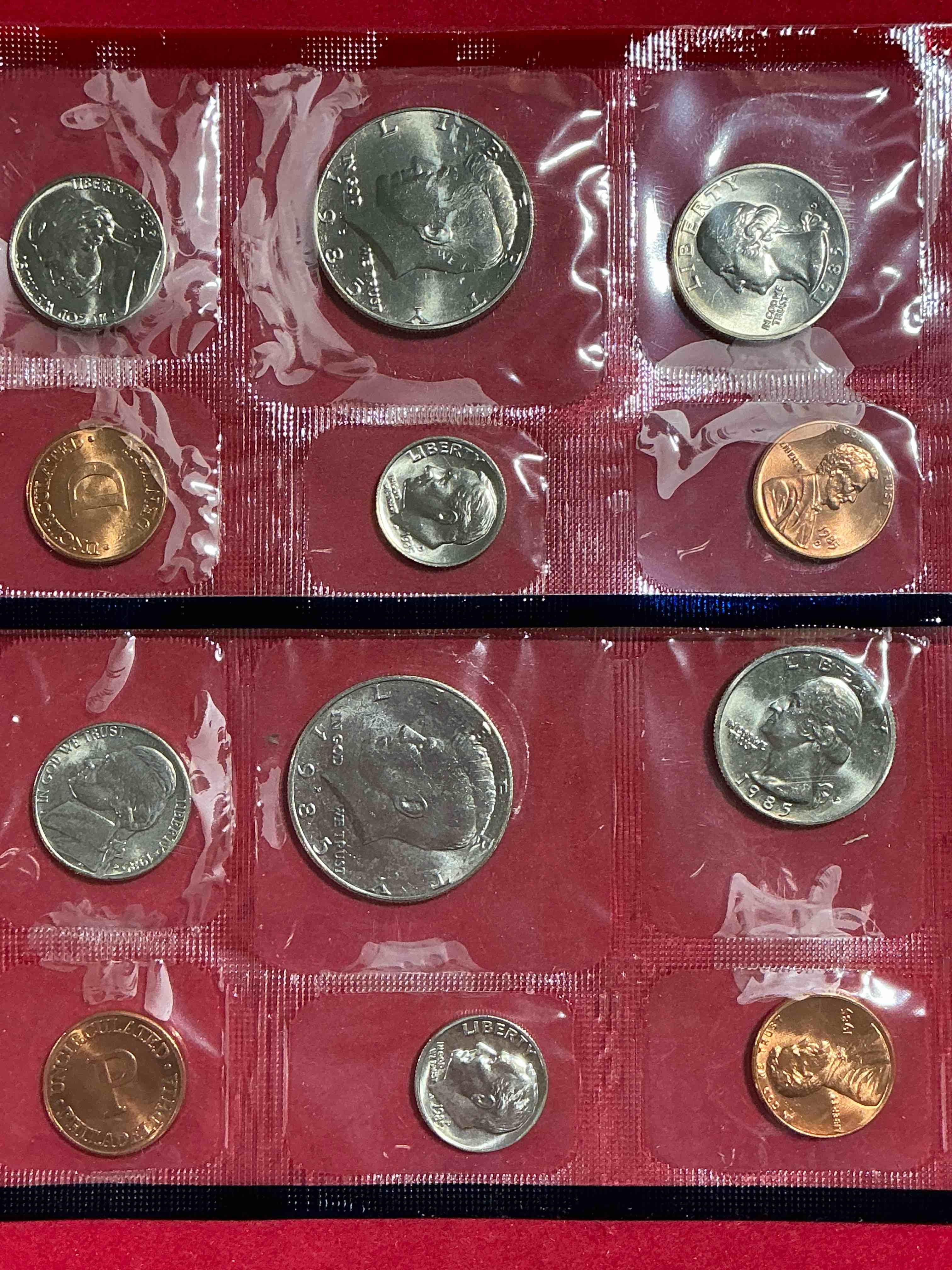 1985 uncirculated philadelphia & denver 12 coin mint combo! these beautiful, uncirculated coins are rare pieces of history! 1985 dimes, pennies half dollars, nickels & quarters!