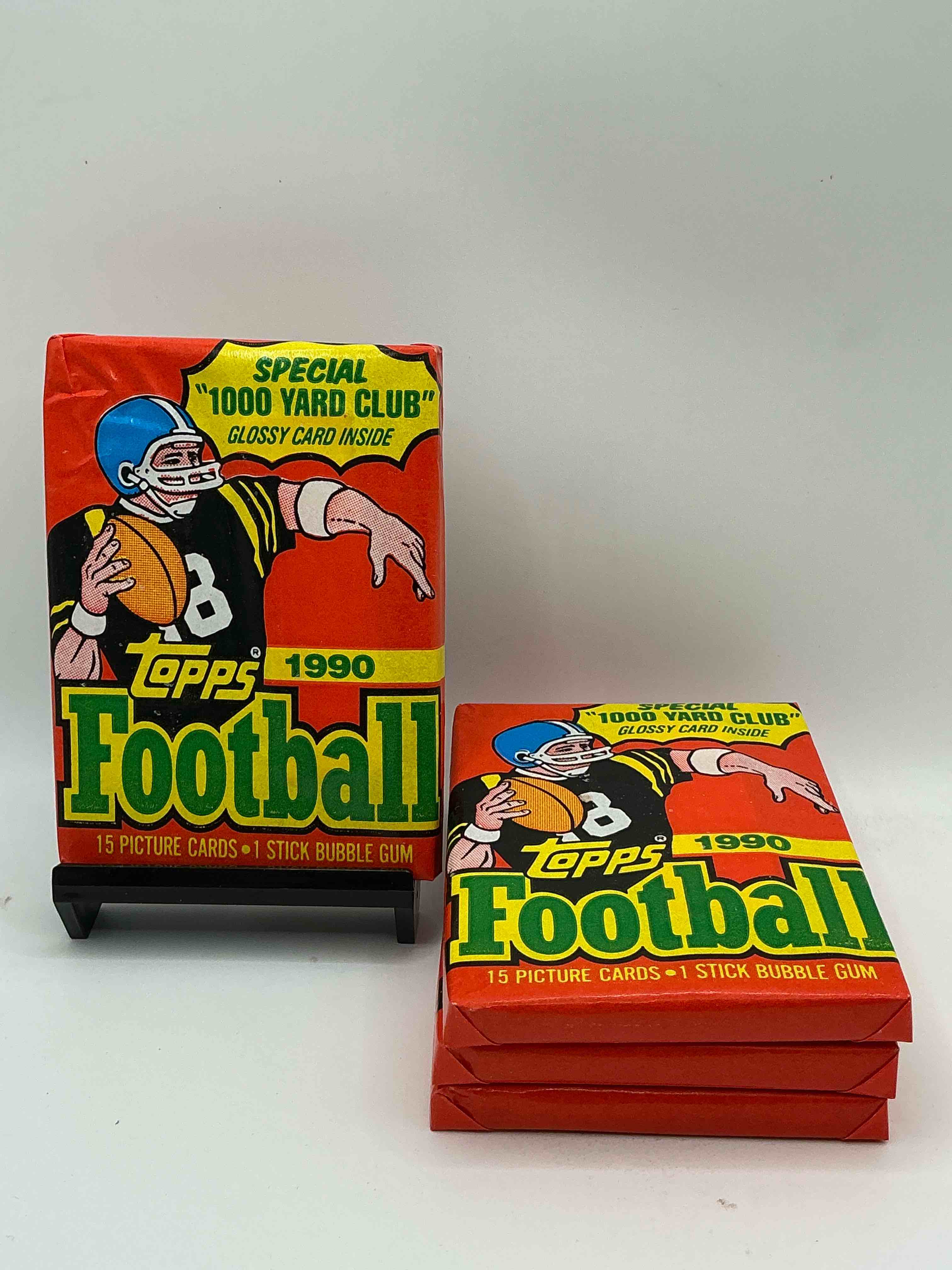 the last year of football wax! joe montana, emmitt smith & barry sanders!? 1990 topps football unopened sports card wax pack, direct from original retail box! getting hard to find! search for early barry sanders & jerry rice & so much more!