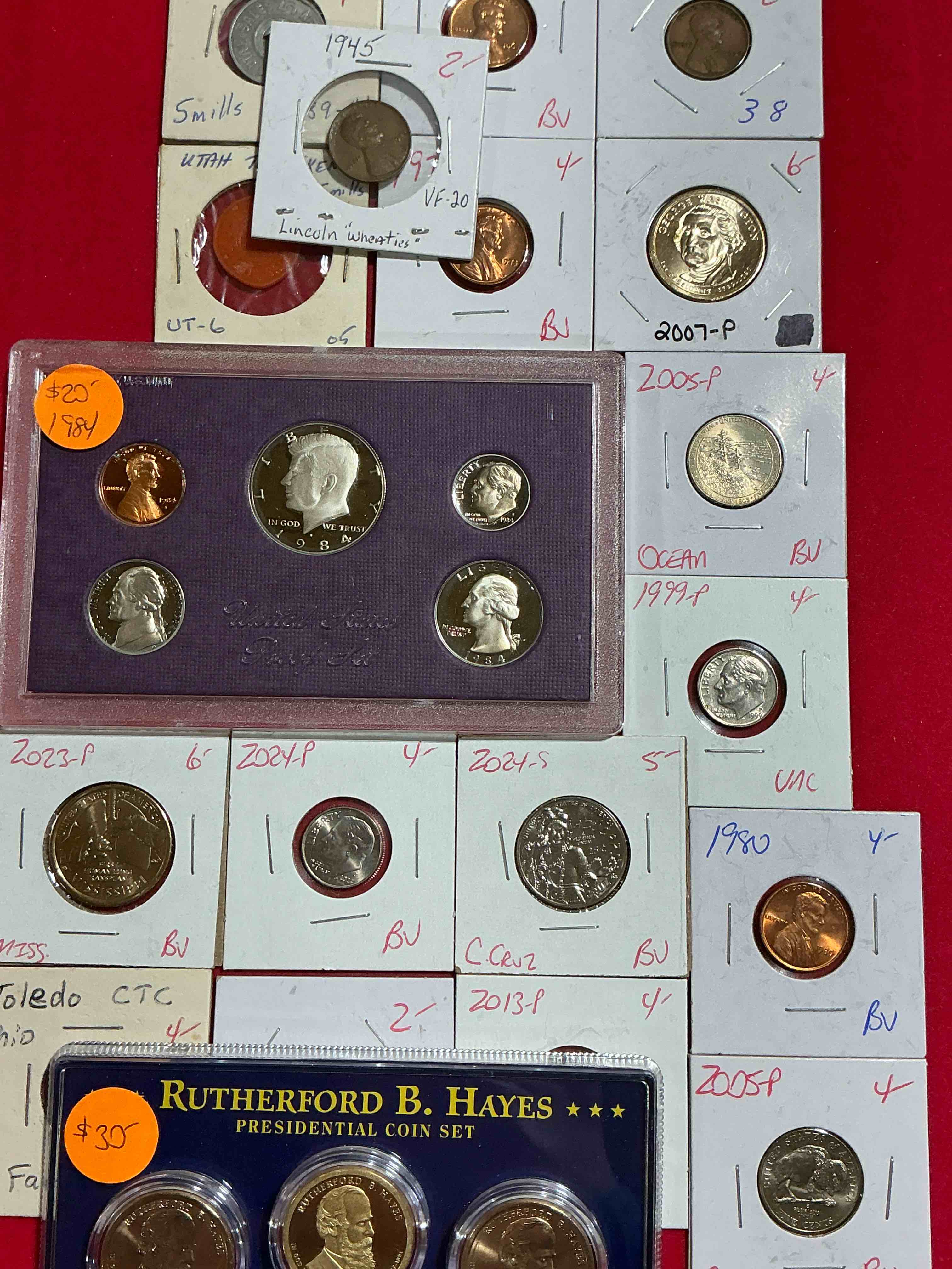 cool coin closeout! wow! awesome u.s. coins & more, antique, vintage & modern galore! many uncirculated! check out this incredible closeout collection of incredibly cool coins & rare items spanning decades! bid is per coin/item & all coins encased for protection! a true smorgasbord collector's dream! each collection is unique and includes items such as rare antique coins, rare date coins, coin sets, modern uncirculated coins, wooden tokens, cool medallions & more! disregard original price marks on pieces, this is a true auction closeout! an incredible opportunity for re-sellers & collectors!