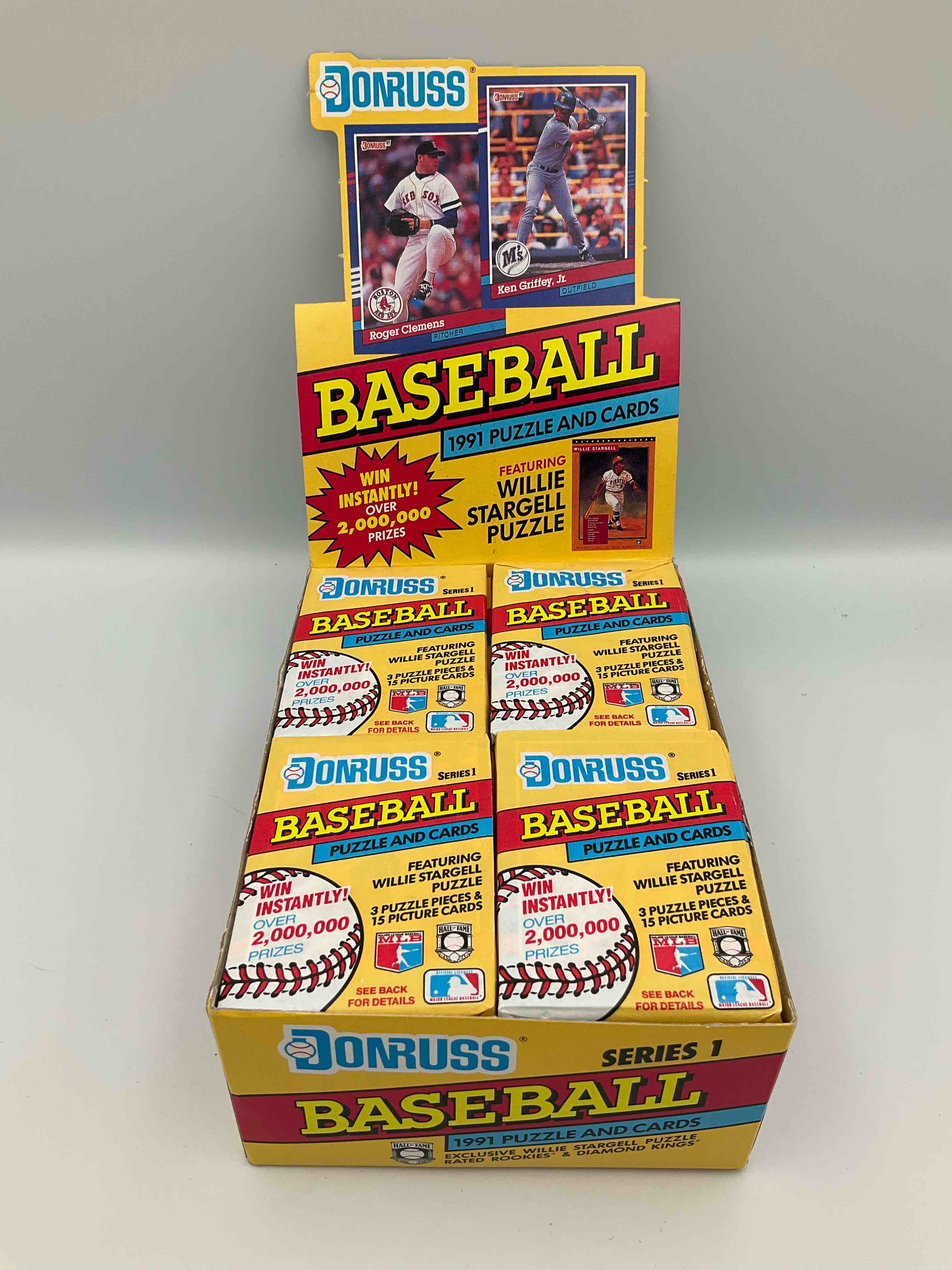 Condition photo showing New/Like New for wow! 1991 donruss series 1 & 2 unopened baseball card wax packs! direct from original box! search for valuable ken griffey jr. sports trading cards!