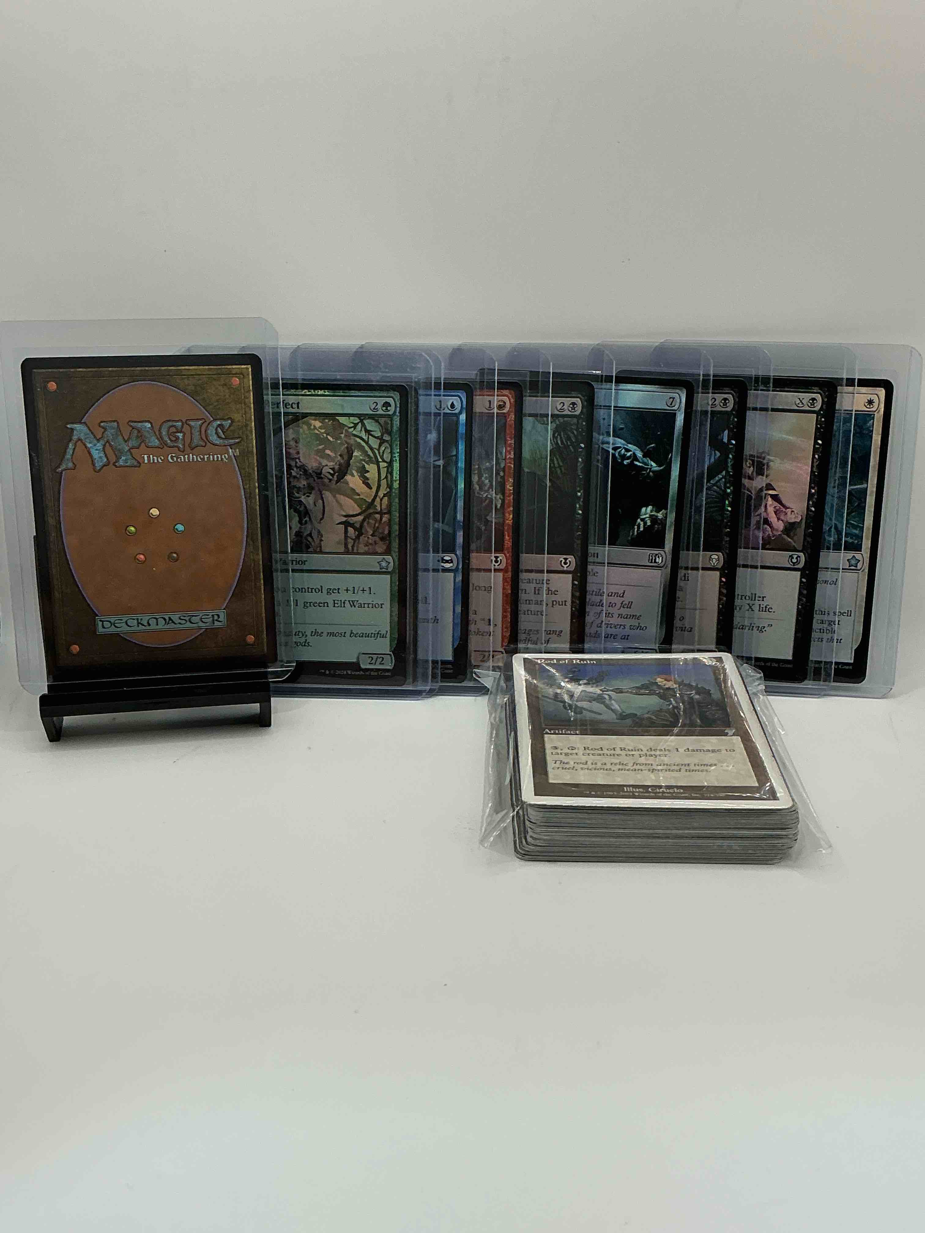 Condition photo showing New/Like New for magic the gathering 50 card lot! lot includes 10 rare or holo foil cards! all cards in excellent shape condition! a great way to join the mtg craze!