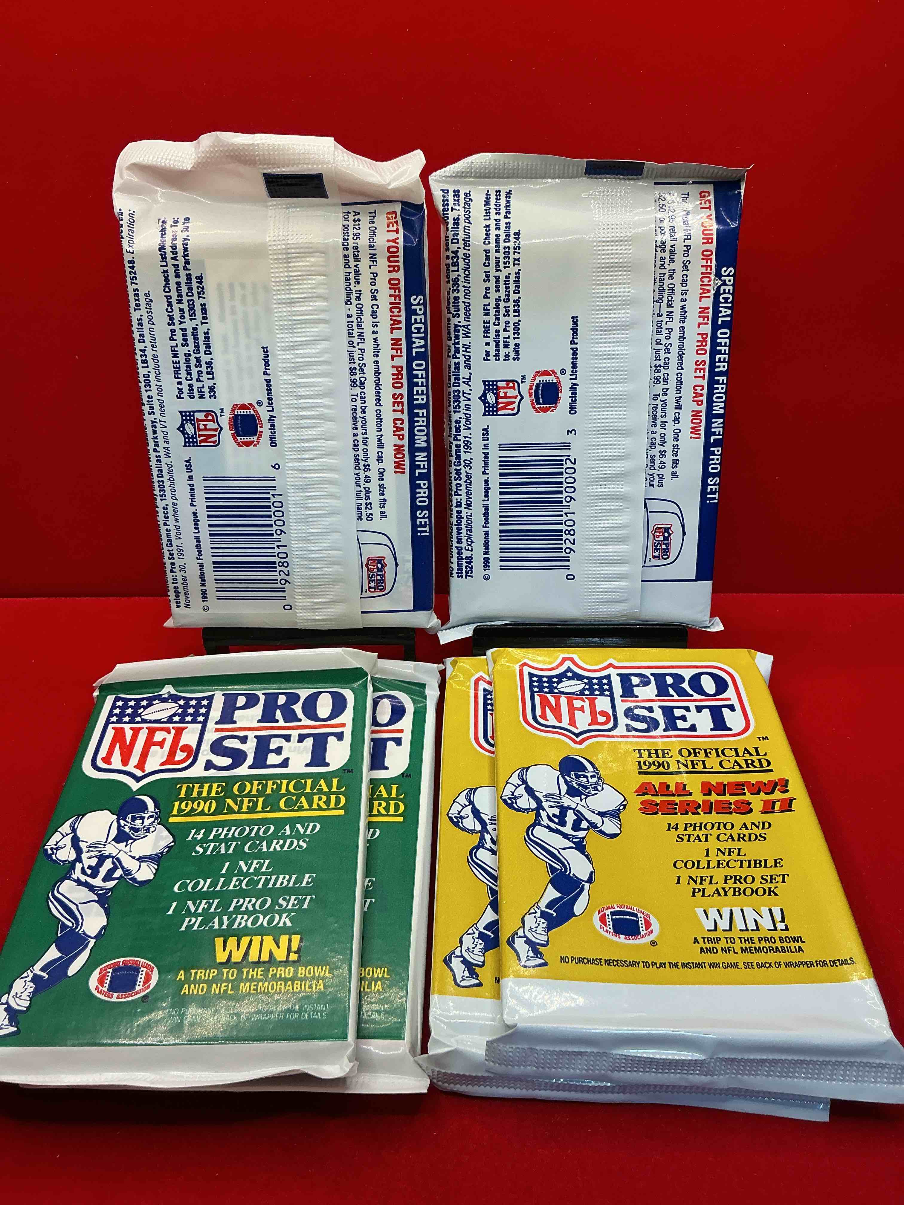 Condition photo showing New/Like New for wow! 1990 pro set football sealed card packs, series i & ii, direct from original retail case!highly sought after by collectors as this year is loaded with high profile cards!search for cards from barry sanders, deion sanders, troy aikman, michael irvin & much more! getting hard to find!