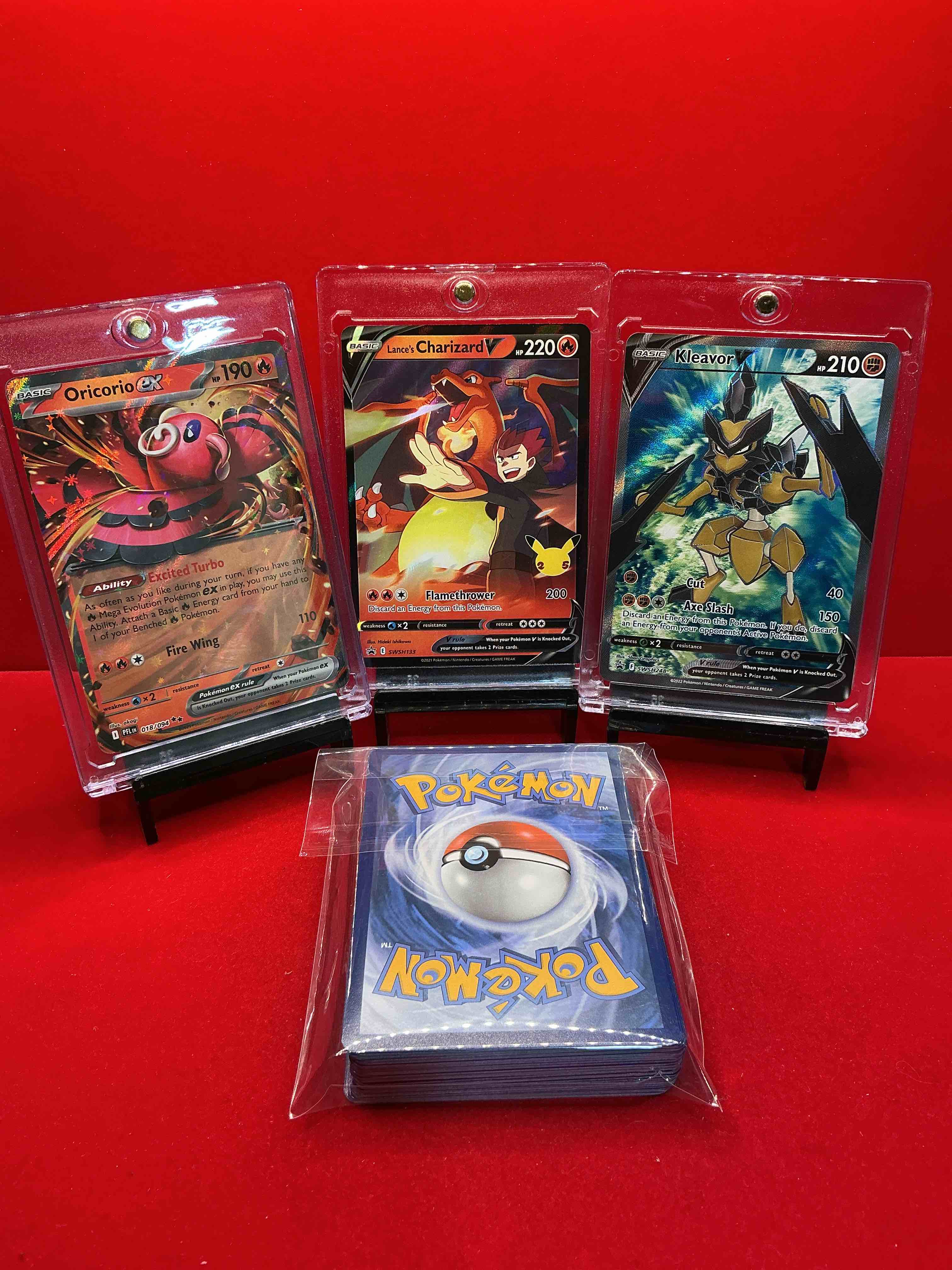 Condition photo showing New/Like New for pokémon! charizard v! oricorio ex! kleavor v! along with 50 other pokémon heroes, holos, legends & commons- including holographic cards, cool holos & more! includes 36 non holo common/ uncommon basic & first stage cards & could even include trainers & energy too! perfect set for collectors & enthusiasts!
